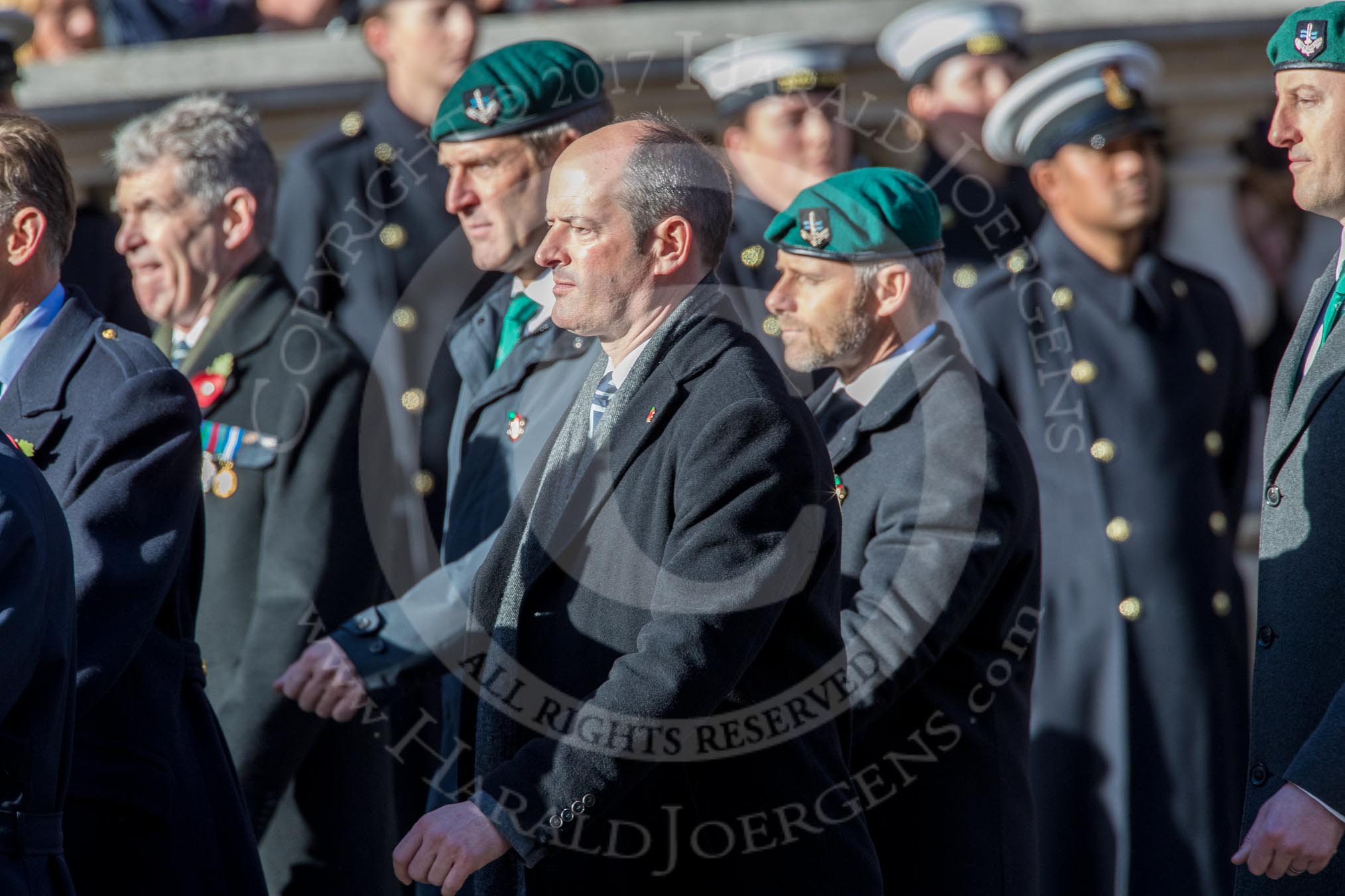 Fleet Air Arm Junglies Association  (Group E12, 22 members) during the Royal British Legion March Past on Remembrance Sunday at the Cenotaph, Whitehall, Westminster, London, 11 November 2018, 11:43.