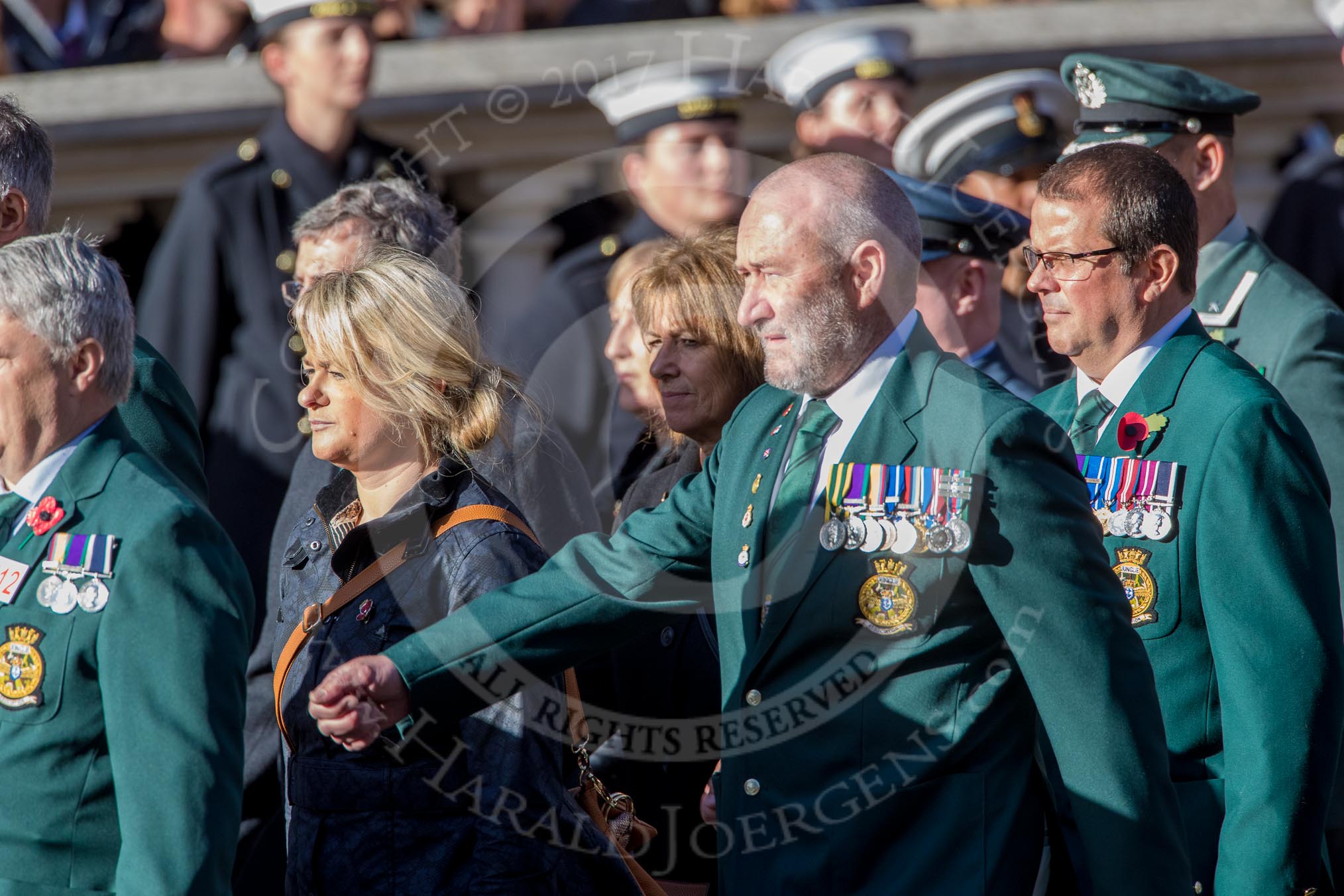 Fleet Air Arm Junglies Association  (Group E12, 22 members) during the Royal British Legion March Past on Remembrance Sunday at the Cenotaph, Whitehall, Westminster, London, 11 November 2018, 11:43.