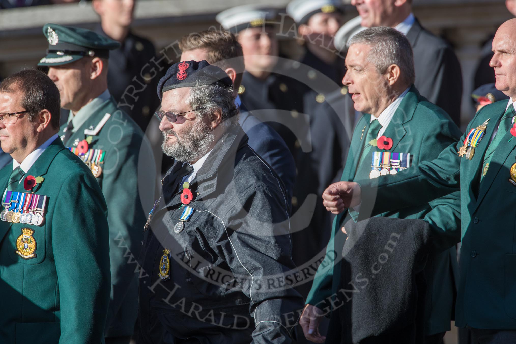 Fleet Air Arm Junglies Association  (Group E12, 22 members) during the Royal British Legion March Past on Remembrance Sunday at the Cenotaph, Whitehall, Westminster, London, 11 November 2018, 11:43.