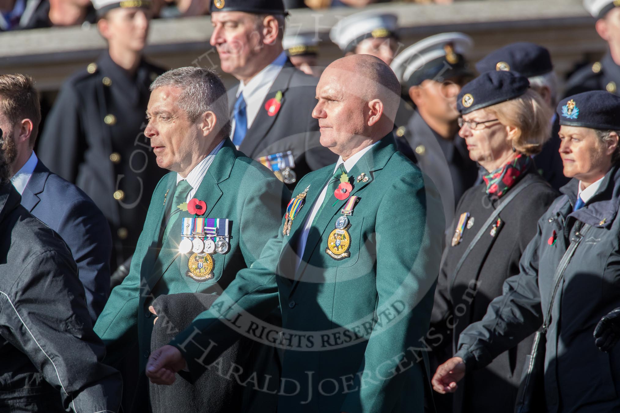 Fleet Air Arm Junglies Association  (Group E12, 22 members) during the Royal British Legion March Past on Remembrance Sunday at the Cenotaph, Whitehall, Westminster, London, 11 November 2018, 11:43.