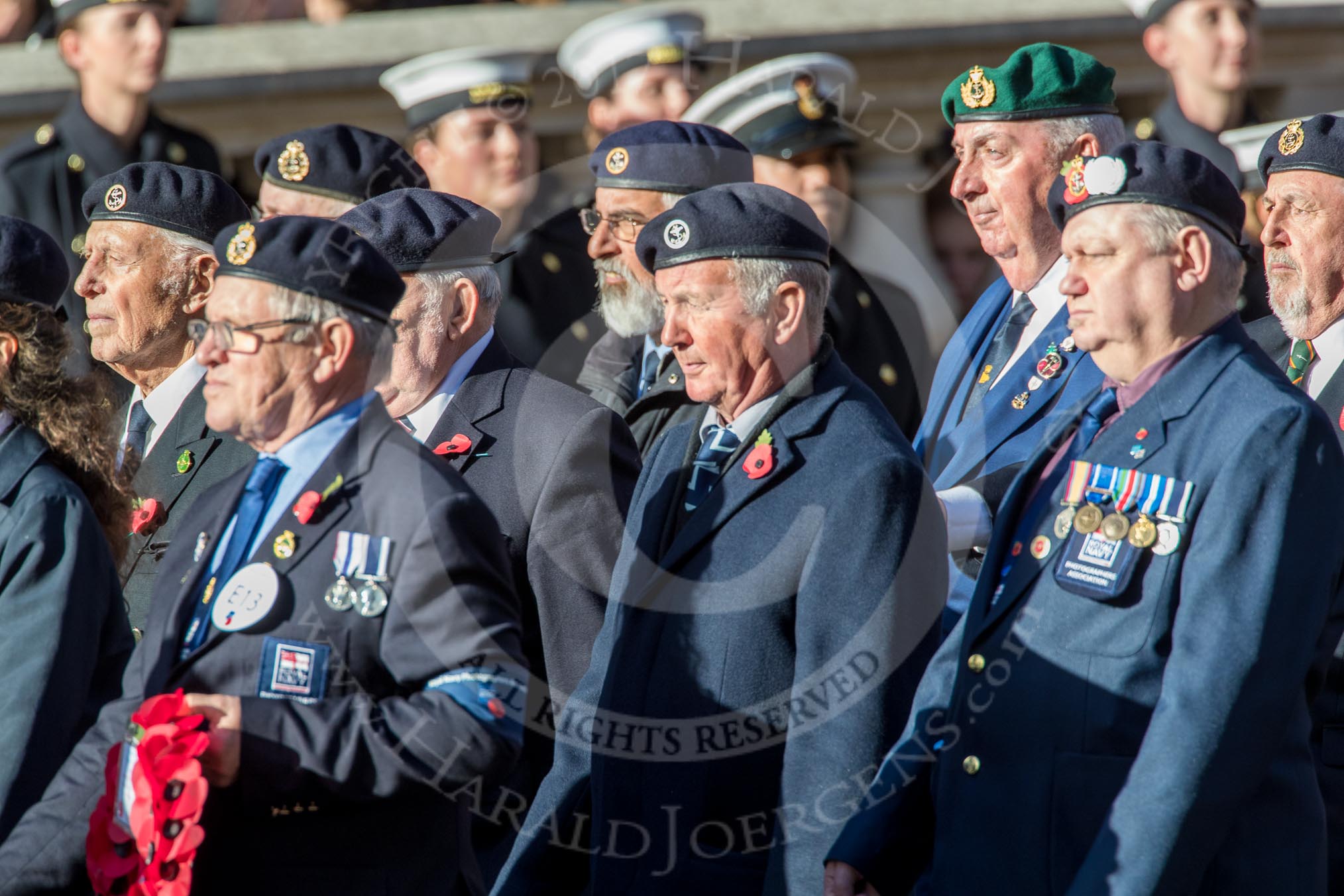 Royal Navy Photographers Association  (Part of the Fly Navy Federation conti (Group E13, 23 members) during the Royal British Legion March Past on Remembrance Sunday at the Cenotaph, Whitehall, Westminster, London, 11 November 2018, 11:43.