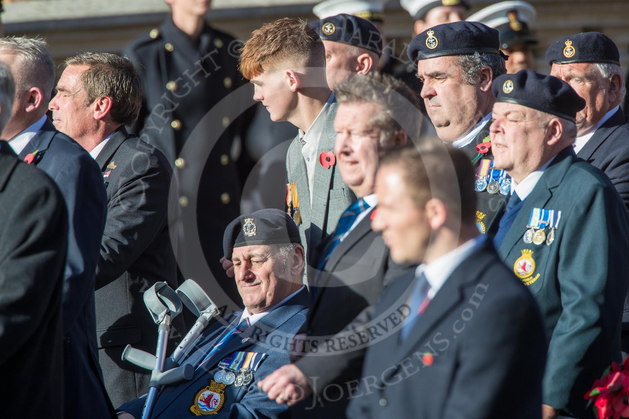 HMS Ark Royal Association  (Group E27, 28 members) and HMS Exeter Association  (Group E28, 25 members) during the Royal British Legion March Past on Remembrance Sunday at the Cenotaph, Whitehall, Westminster, London, 11 November 2018, 11:44.