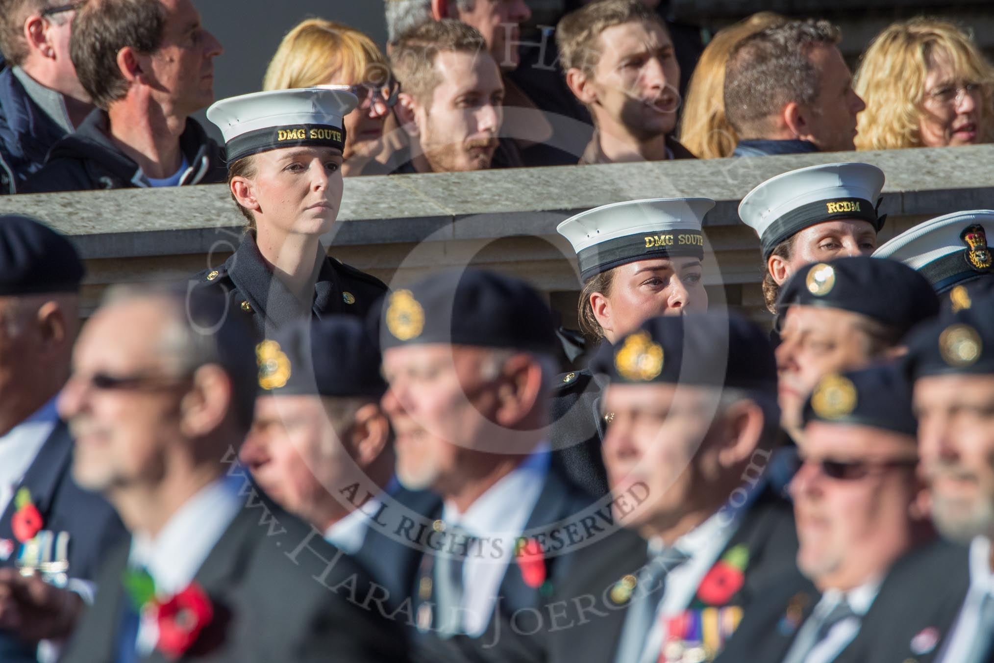 A tall Royal Navy lady overlooking HMS Glasgow Association  (Group E29, 29 members) during the Royal British Legion March Past on Remembrance Sunday at the Cenotaph, Whitehall, Westminster, London, 11 November 2018, 11:45.