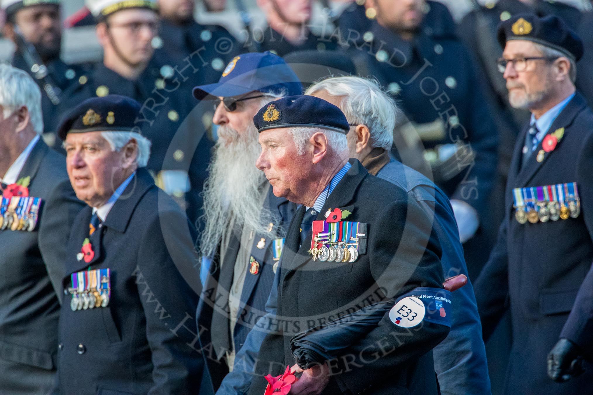 Royal Fleet Auxiliary Association  (Group E33, 15 members) during the Royal British Legion March Past on Remembrance Sunday at the Cenotaph, Whitehall, Westminster, London, 11 November 2018, 11:45.