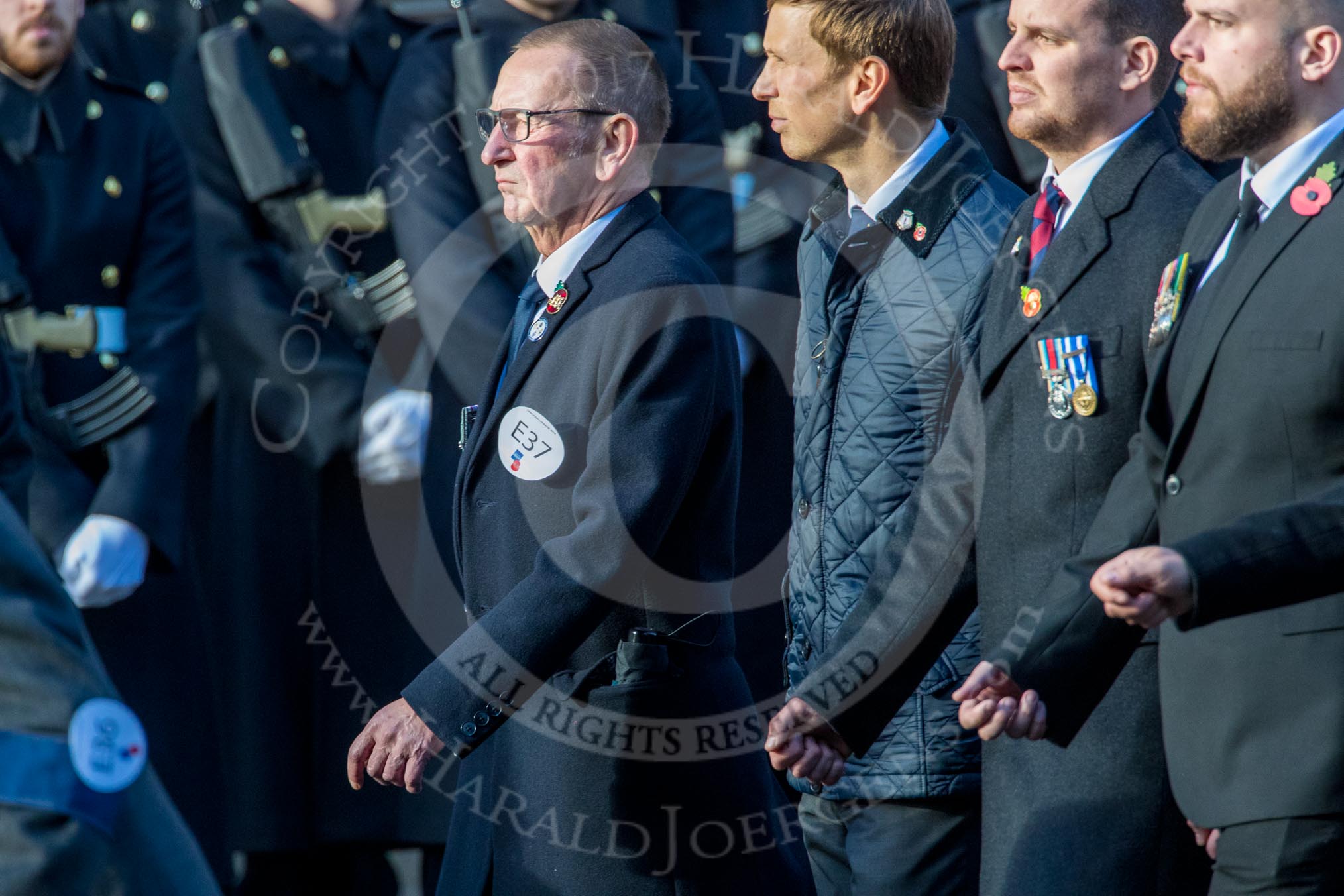 The Four Ships Yangtze Incident Association   (Group E37, 20 members) during the Royal British Legion March Past on Remembrance Sunday at the Cenotaph, Whitehall, Westminster, London, 11 November 2018, 11:46.