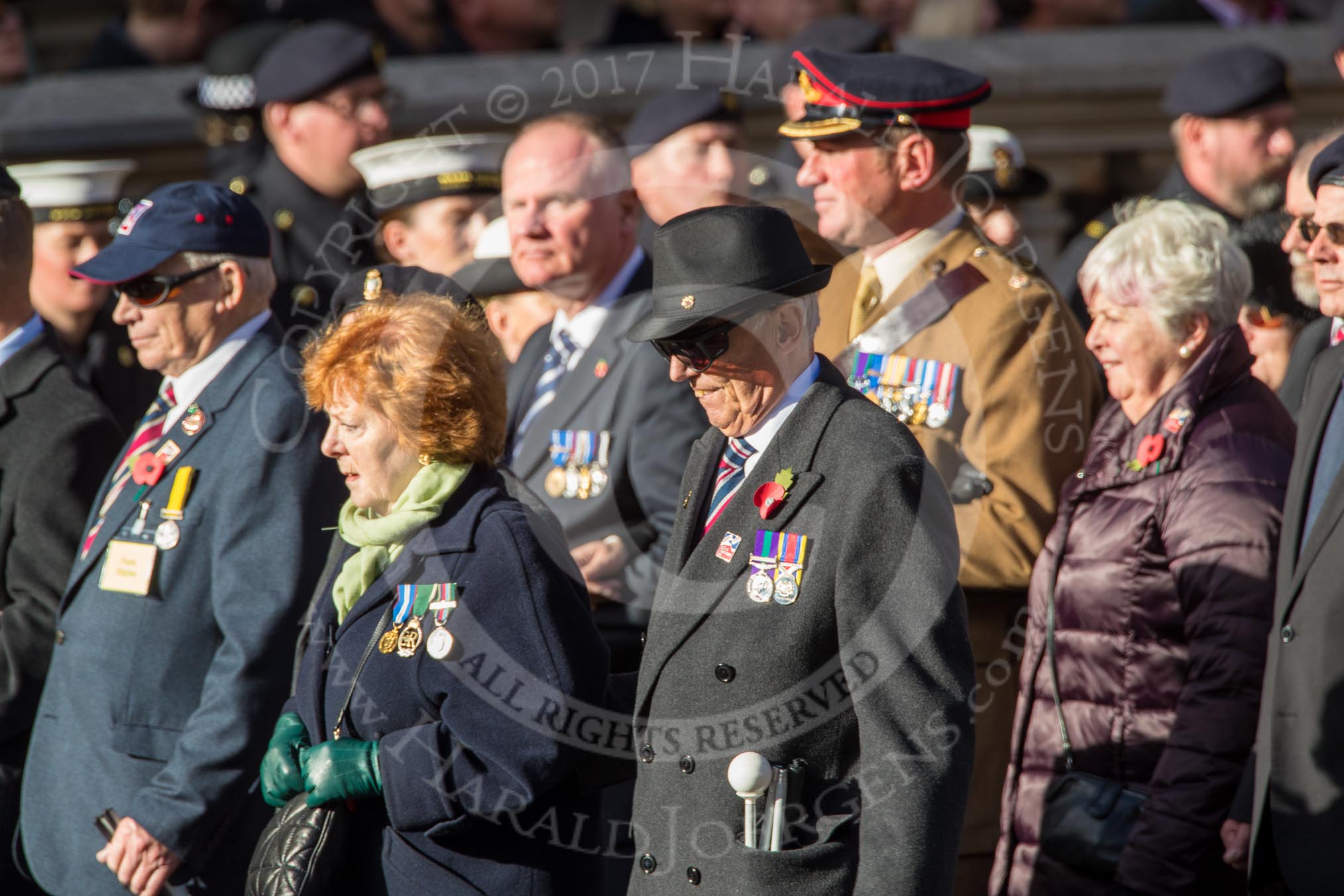 Blind Veterans UK (Group AA7, 215 members) during the Royal British Legion March Past on Remembrance Sunday at the Cenotaph, Whitehall, Westminster, London, 11 November 2018, 12:04.