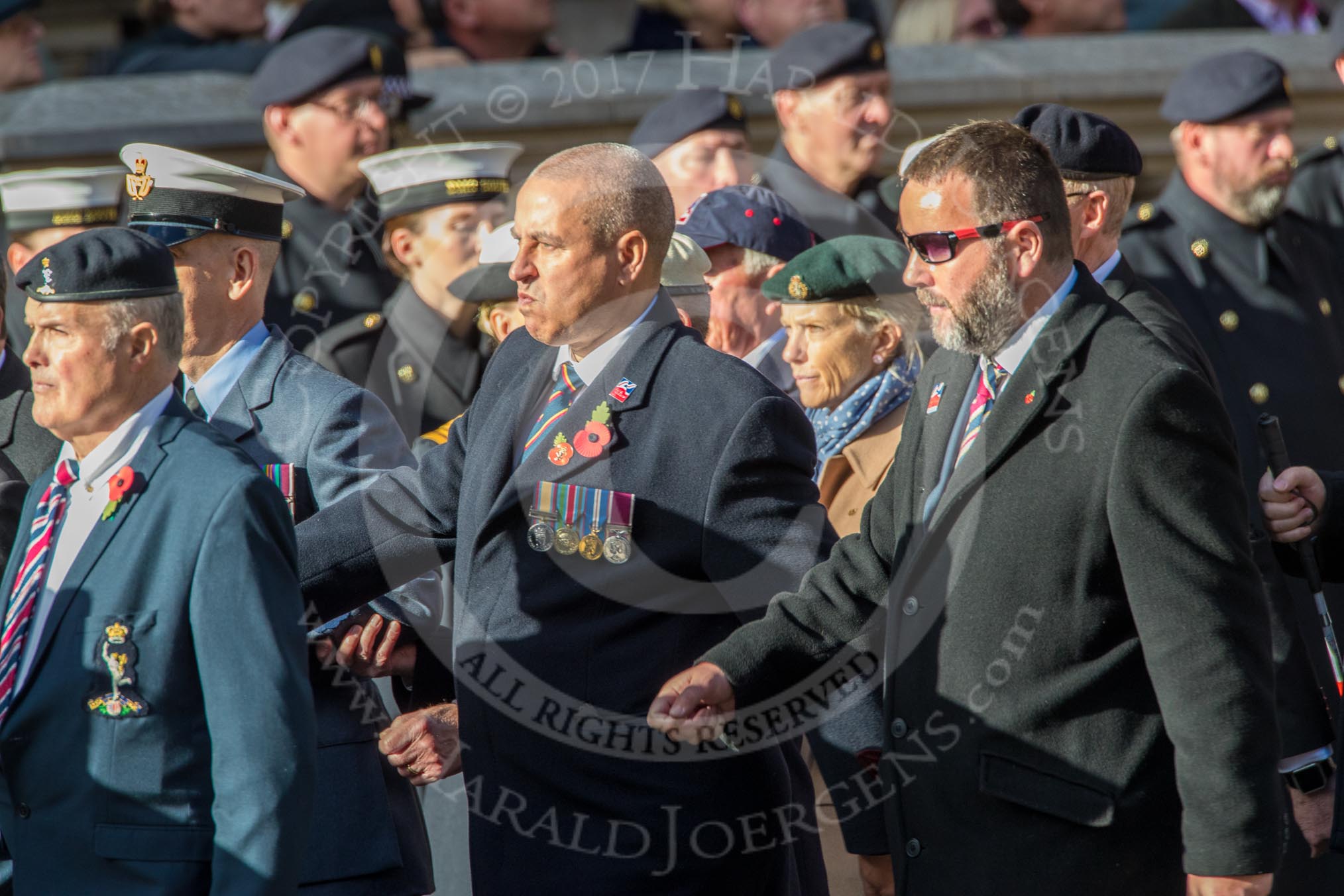 Blind Veterans UK (Group AA7, 215 members) during the Royal British Legion March Past on Remembrance Sunday at the Cenotaph, Whitehall, Westminster, London, 11 November 2018, 12:04.