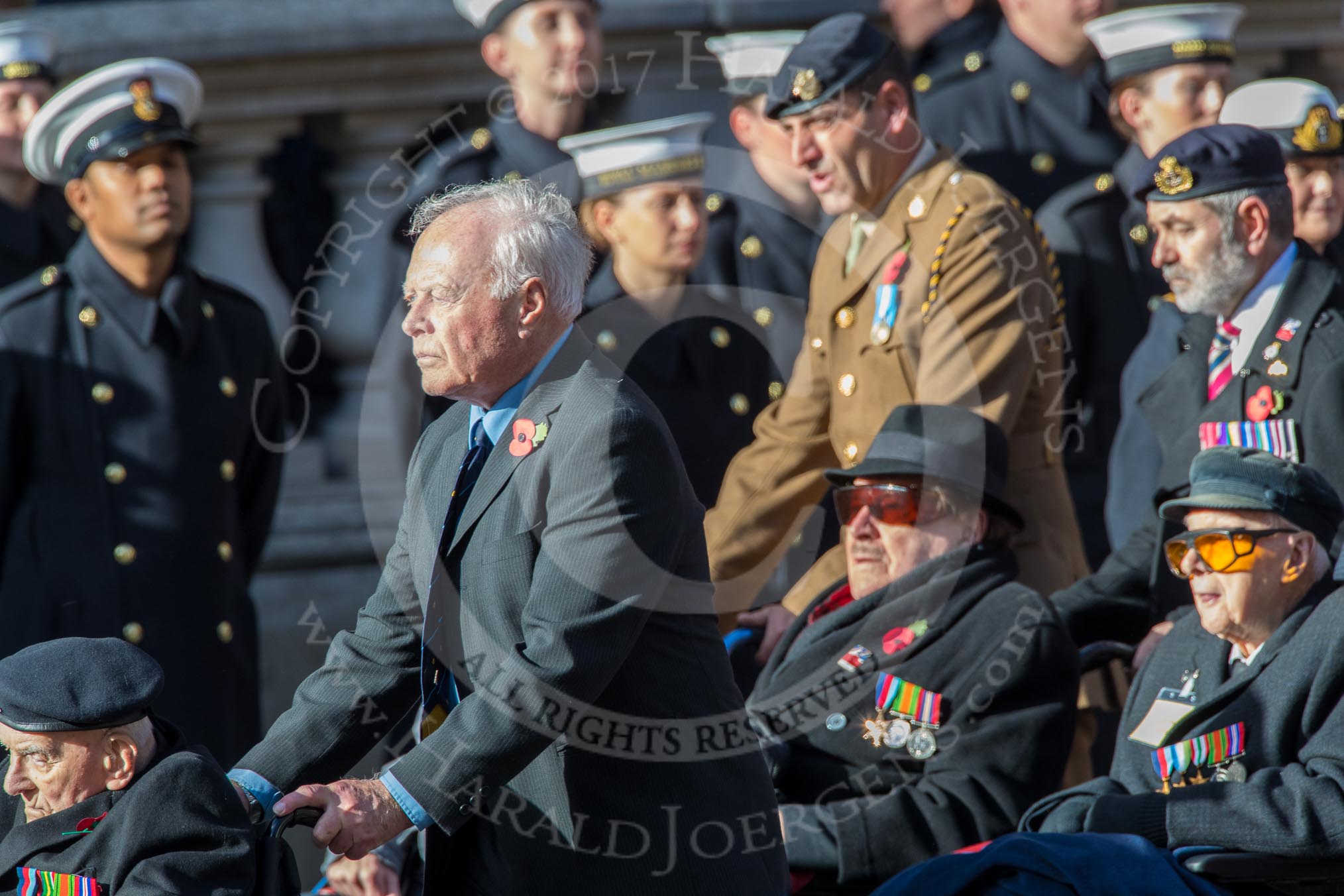 Blind Veterans UK (Group AA7, 215 members) during the Royal British Legion March Past on Remembrance Sunday at the Cenotaph, Whitehall, Westminster, London, 11 November 2018, 12:05.