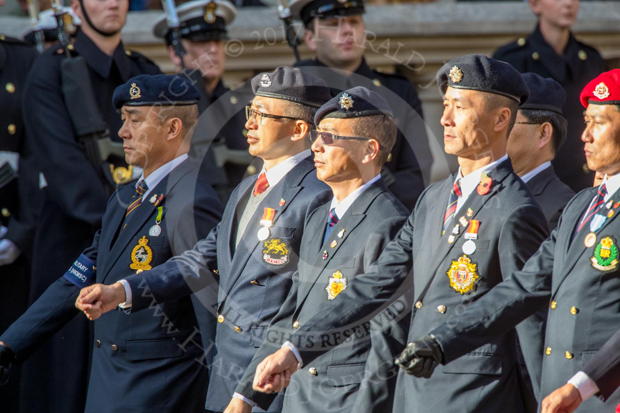 Hong Kong Military Service Corps - HKMSC (Group D21, 36 members) during the Royal British Legion March Past on Remembrance Sunday at the Cenotaph, Whitehall, Westminster, London, 11 November 2018, 12:24.