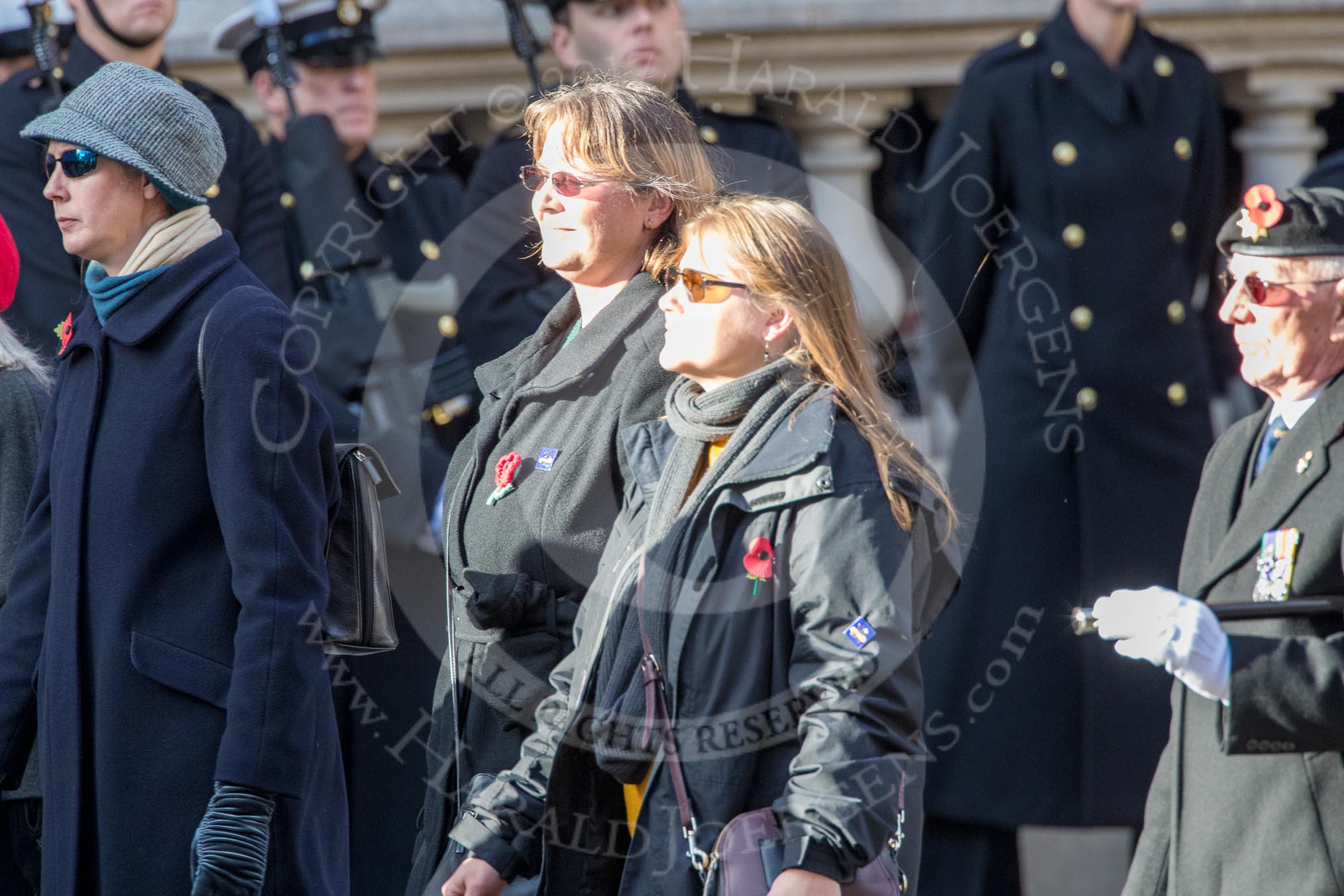 Munitions Workers Association (Group M3, 21 members) during the Royal British Legion March Past on Remembrance Sunday at the Cenotaph, Whitehall, Westminster, London, 11 November 2018, 12:25.