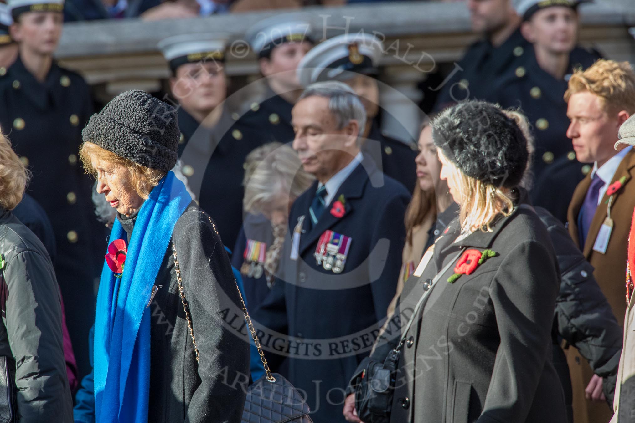 The British Evacuees Association (Group M4, 50 members) during the Royal British Legion March Past on Remembrance Sunday at the Cenotaph, Whitehall, Westminster, London, 11 November 2018, 12:25.