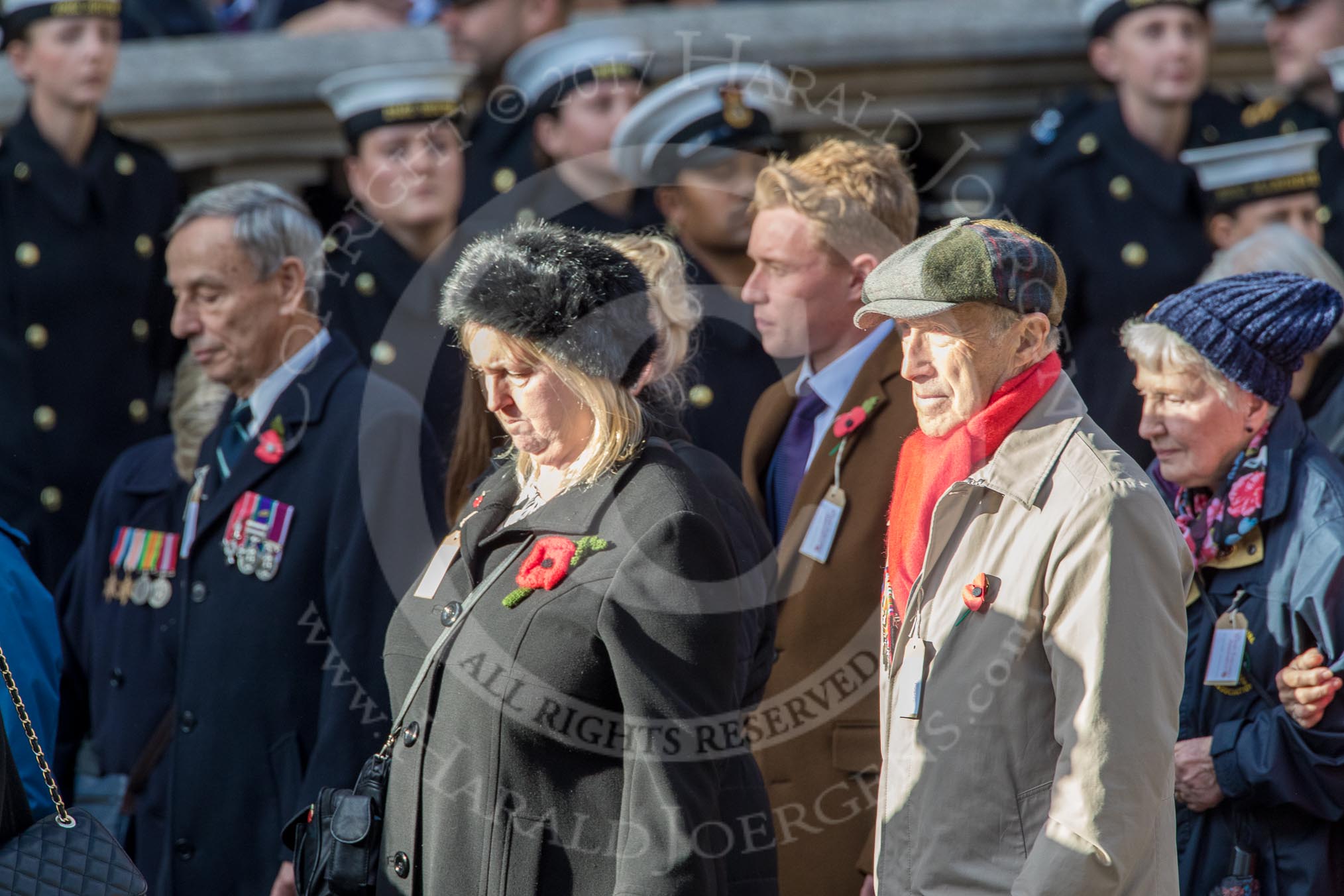 The British Evacuees Association (Group M4, 50 members) during the Royal British Legion March Past on Remembrance Sunday at the Cenotaph, Whitehall, Westminster, London, 11 November 2018, 12:25.