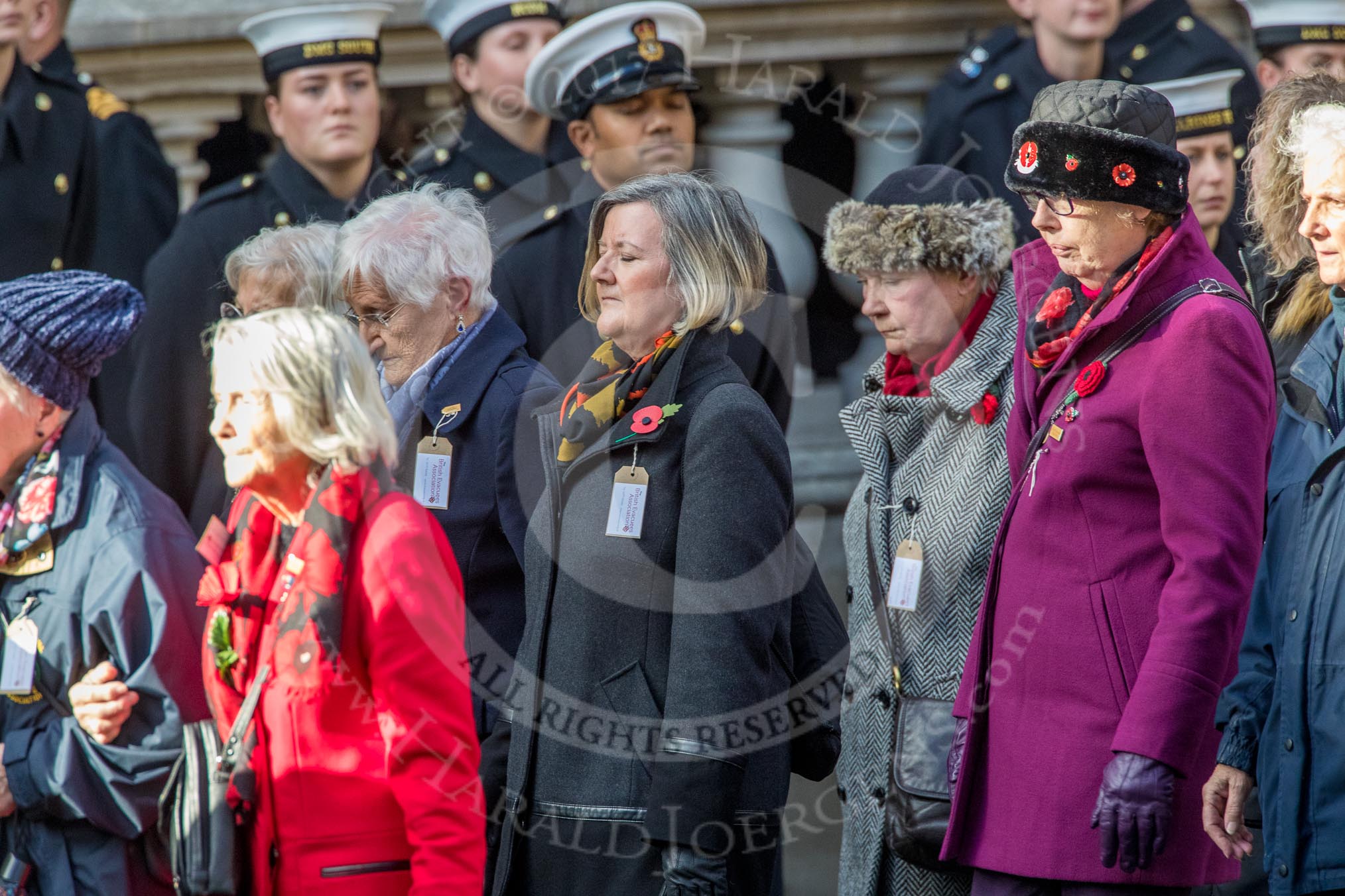 The British Evacuees Association (Group M4, 50 members) during the Royal British Legion March Past on Remembrance Sunday at the Cenotaph, Whitehall, Westminster, London, 11 November 2018, 12:25.