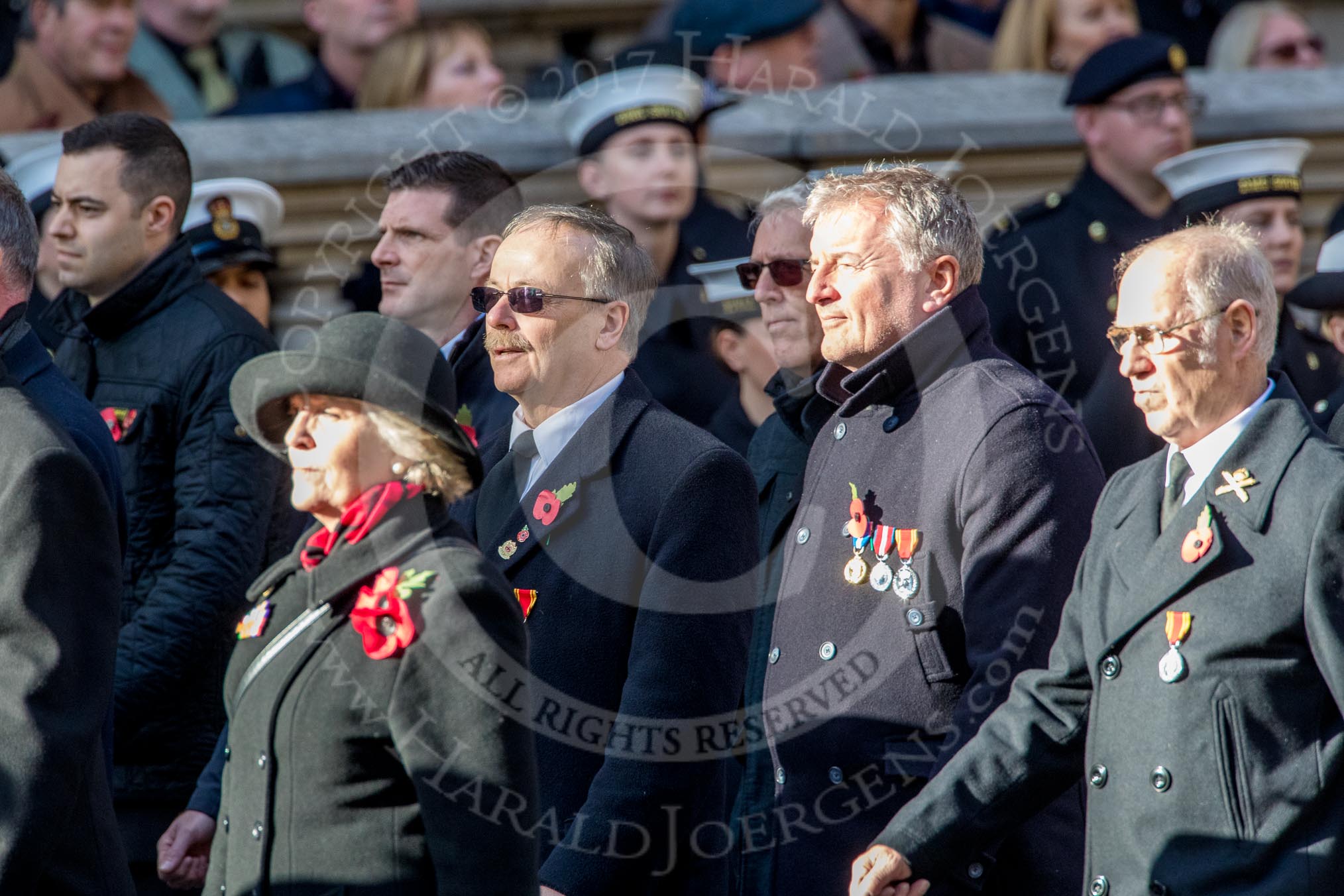 The Firefighters Memorial Trust (Group M16, 25 members) during the Royal British Legion March Past on Remembrance Sunday at the Cenotaph, Whitehall, Westminster, London, 11 November 2018, 12:26.