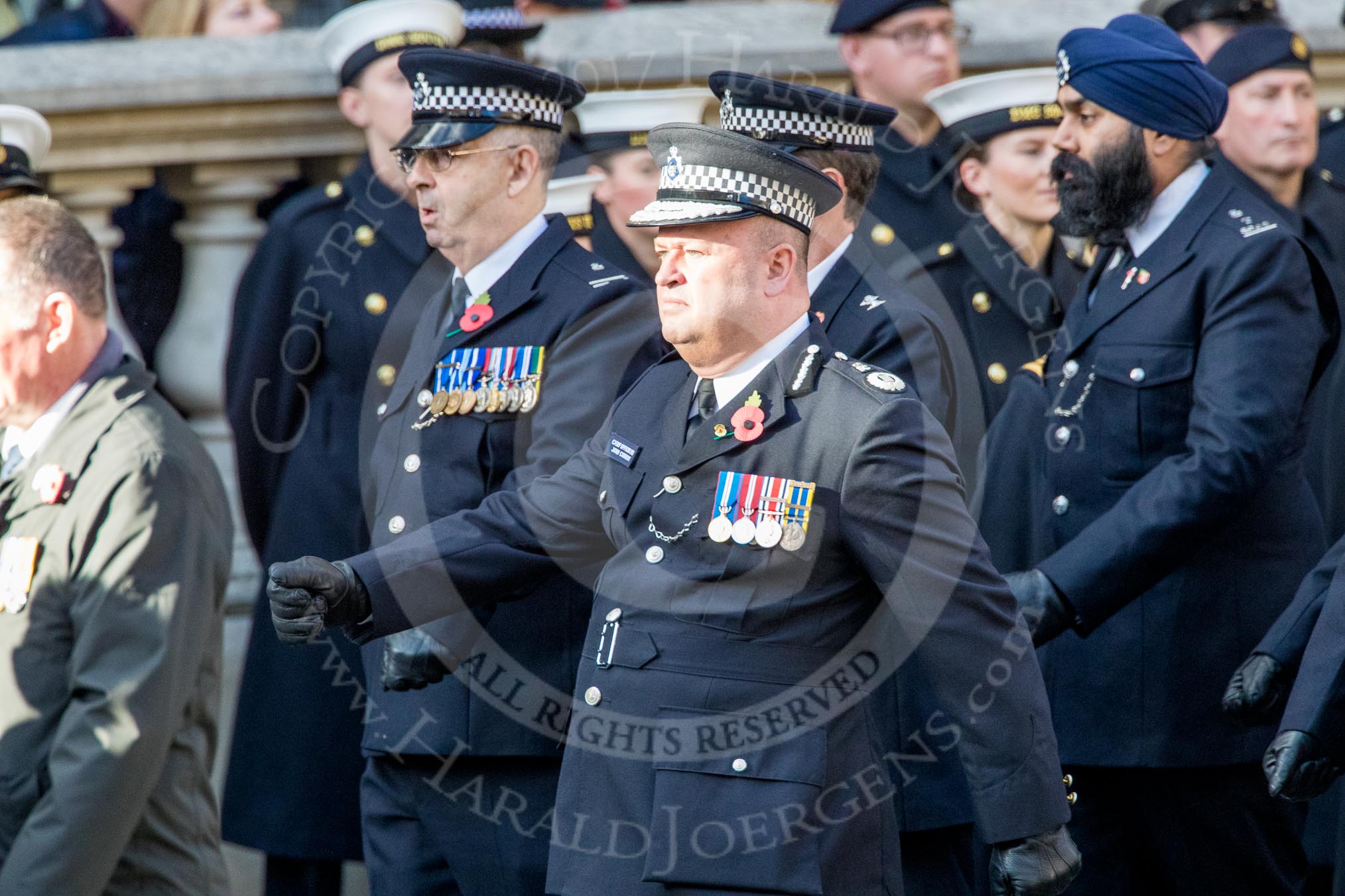 Metropolitan Special Constabulary (Group M17, 40 members) during the Royal British Legion March Past on Remembrance Sunday at the Cenotaph, Whitehall, Westminster, London, 11 November 2018, 12:27.