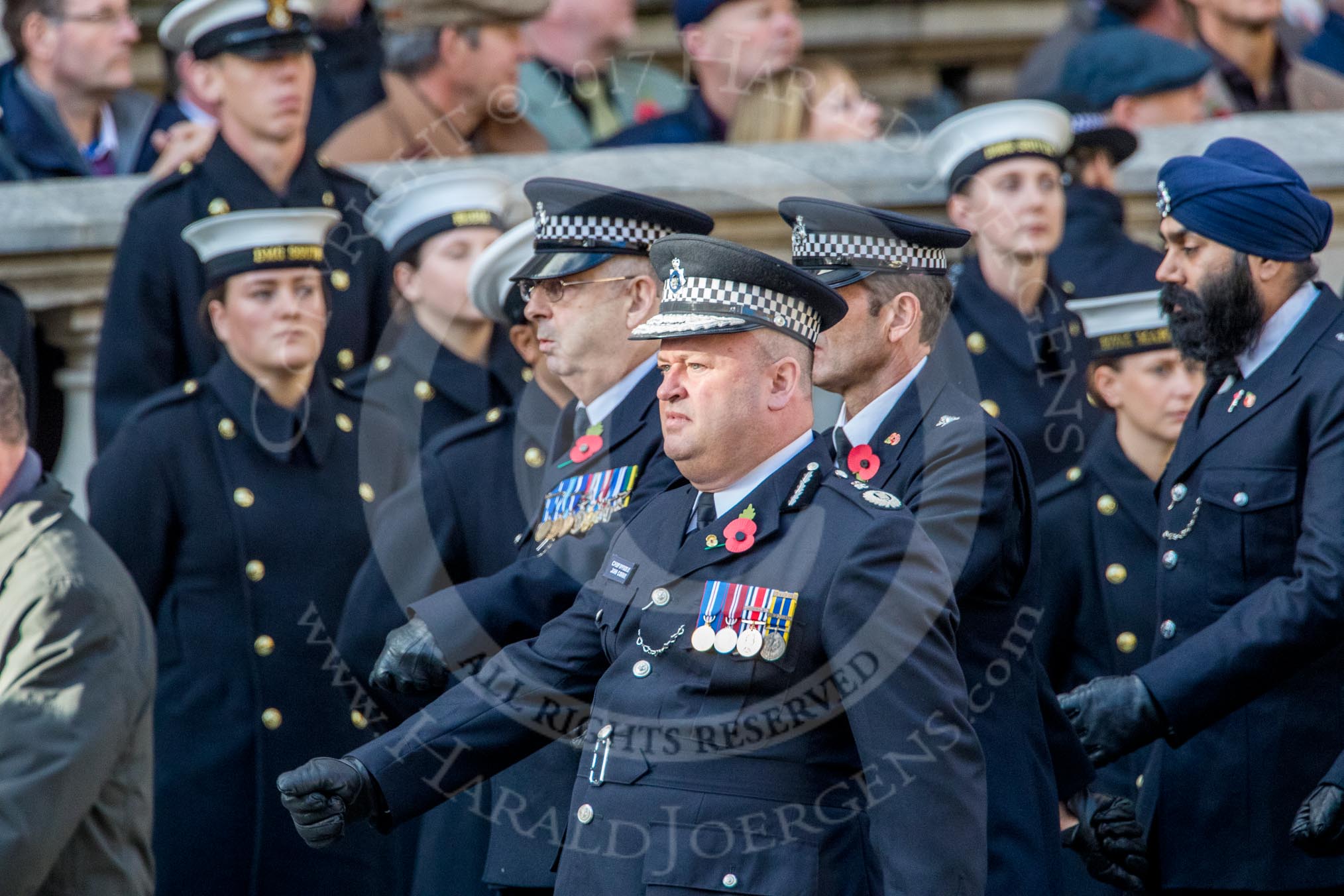 Metropolitan Special Constabulary (Group M17, 40 members) during the Royal British Legion March Past on Remembrance Sunday at the Cenotaph, Whitehall, Westminster, London, 11 November 2018, 12:27.