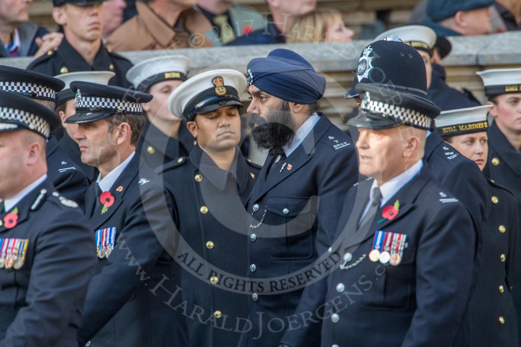 Metropolitan Special Constabulary (Group M17, 40 members) during the Royal British Legion March Past on Remembrance Sunday at the Cenotaph, Whitehall, Westminster, London, 11 November 2018, 12:27.