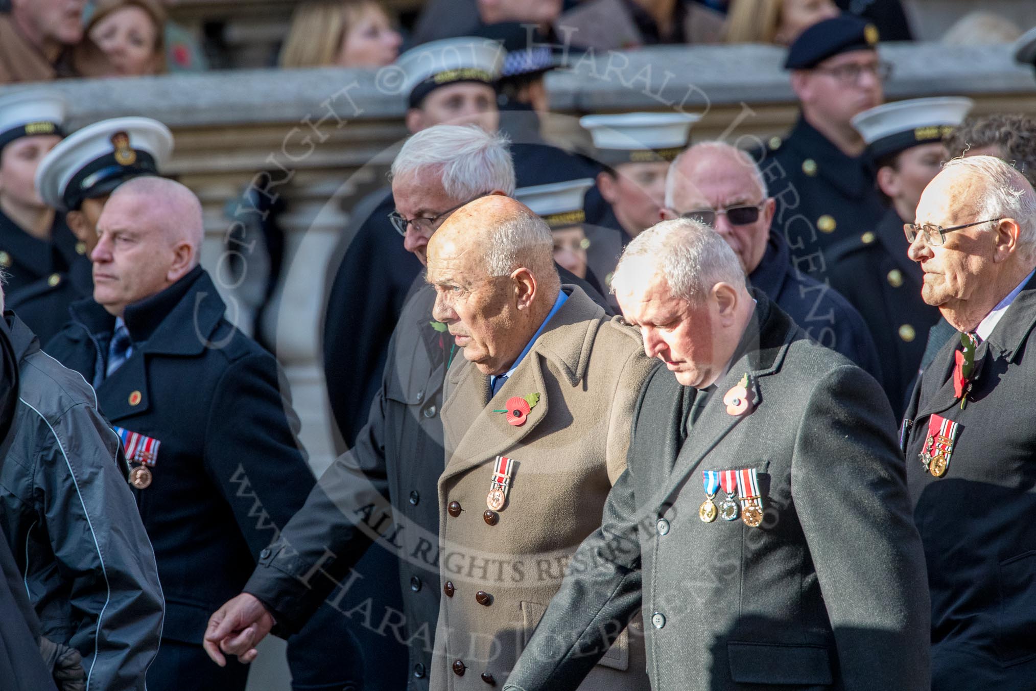 The Showmen's Guild of Great Britain (Group M18, 26 members) during the Royal British Legion March Past on Remembrance Sunday at the Cenotaph, Whitehall, Westminster, London, 11 November 2018, 12:27.
