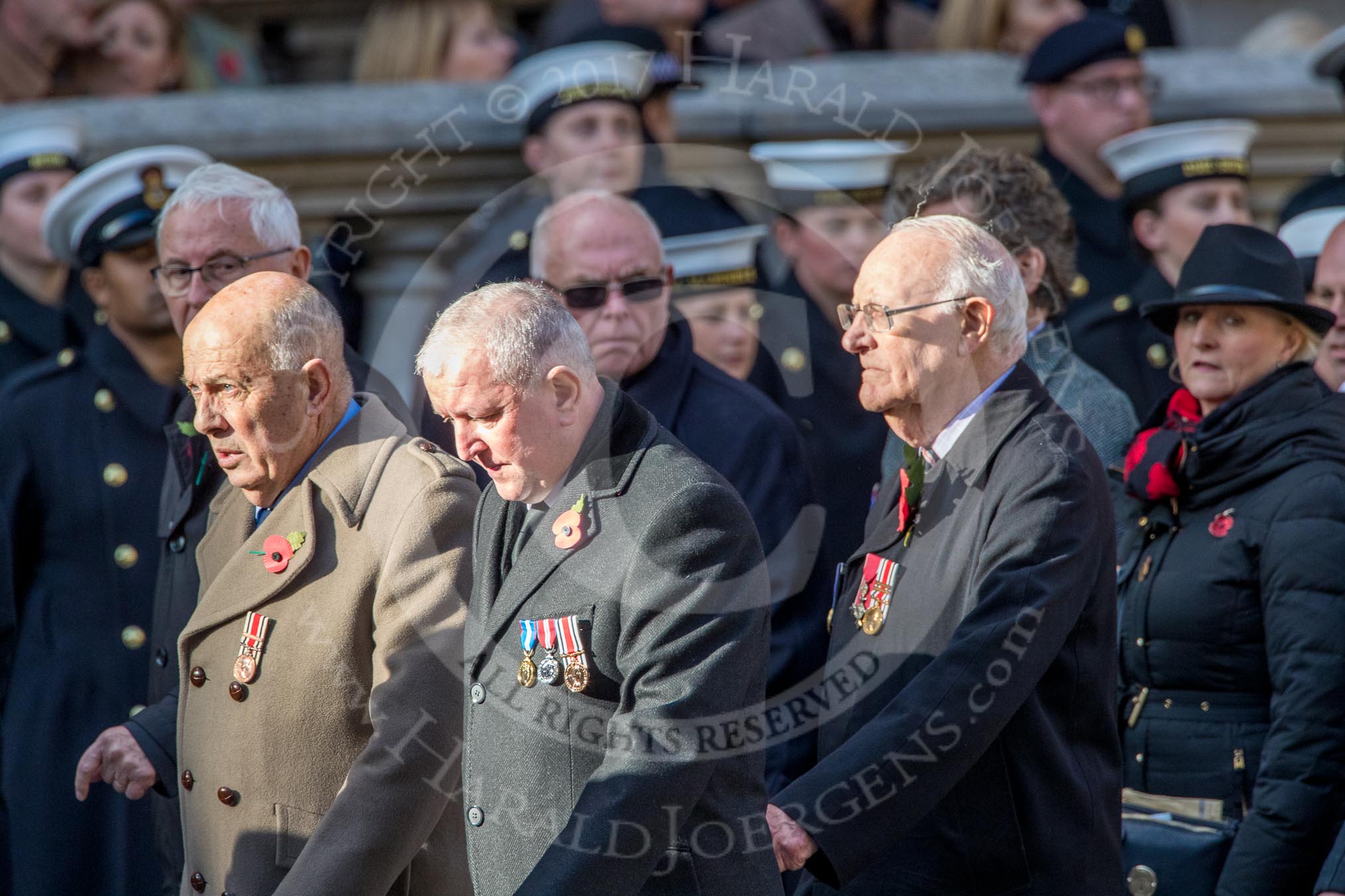 The Showmen's Guild of Great Britain (Group M18, 26 members) during the Royal British Legion March Past on Remembrance Sunday at the Cenotaph, Whitehall, Westminster, London, 11 November 2018, 12:27.