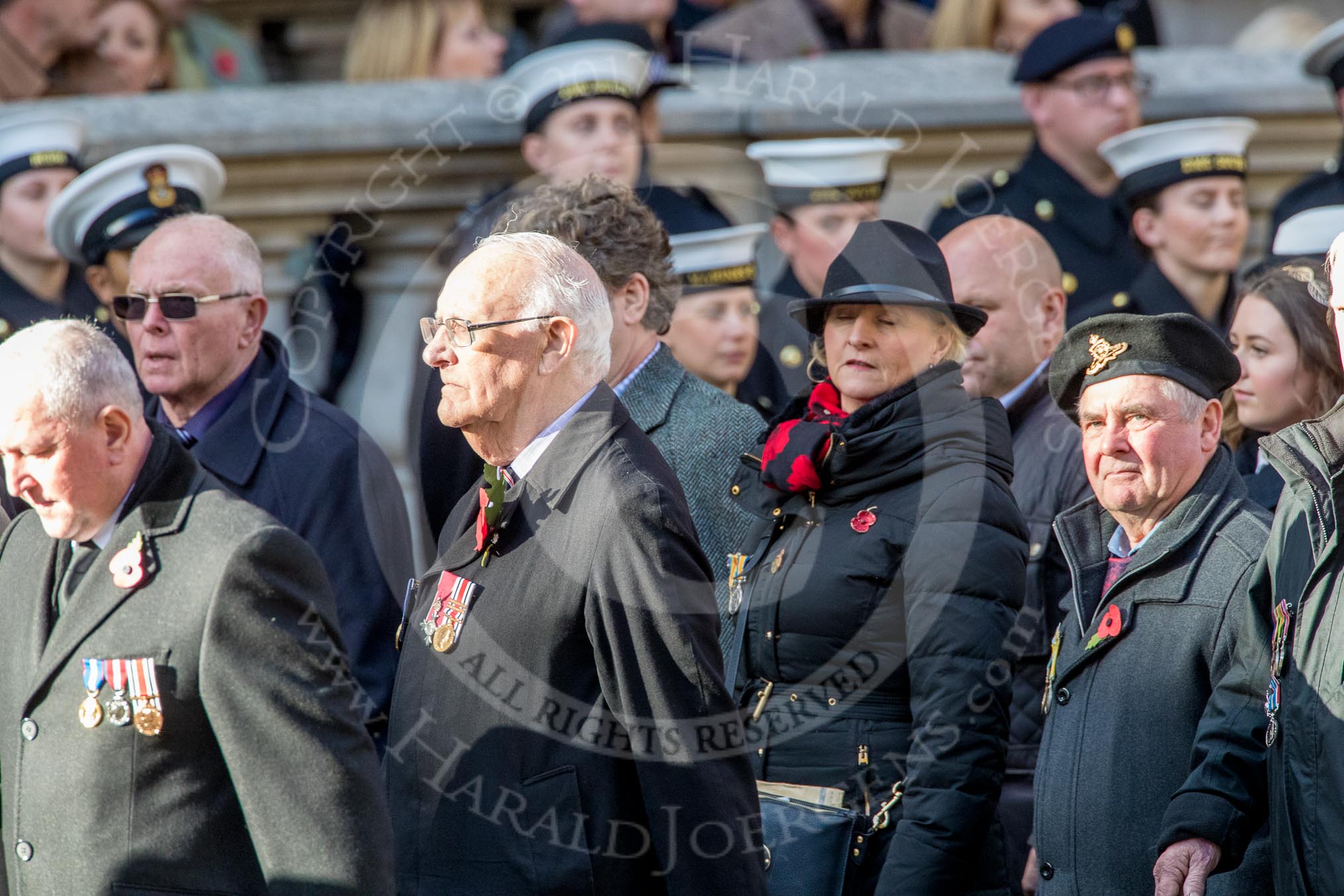 The Showmen's Guild of Great Britain (Group M18, 26 members) during the Royal British Legion March Past on Remembrance Sunday at the Cenotaph, Whitehall, Westminster, London, 11 November 2018, 12:27.