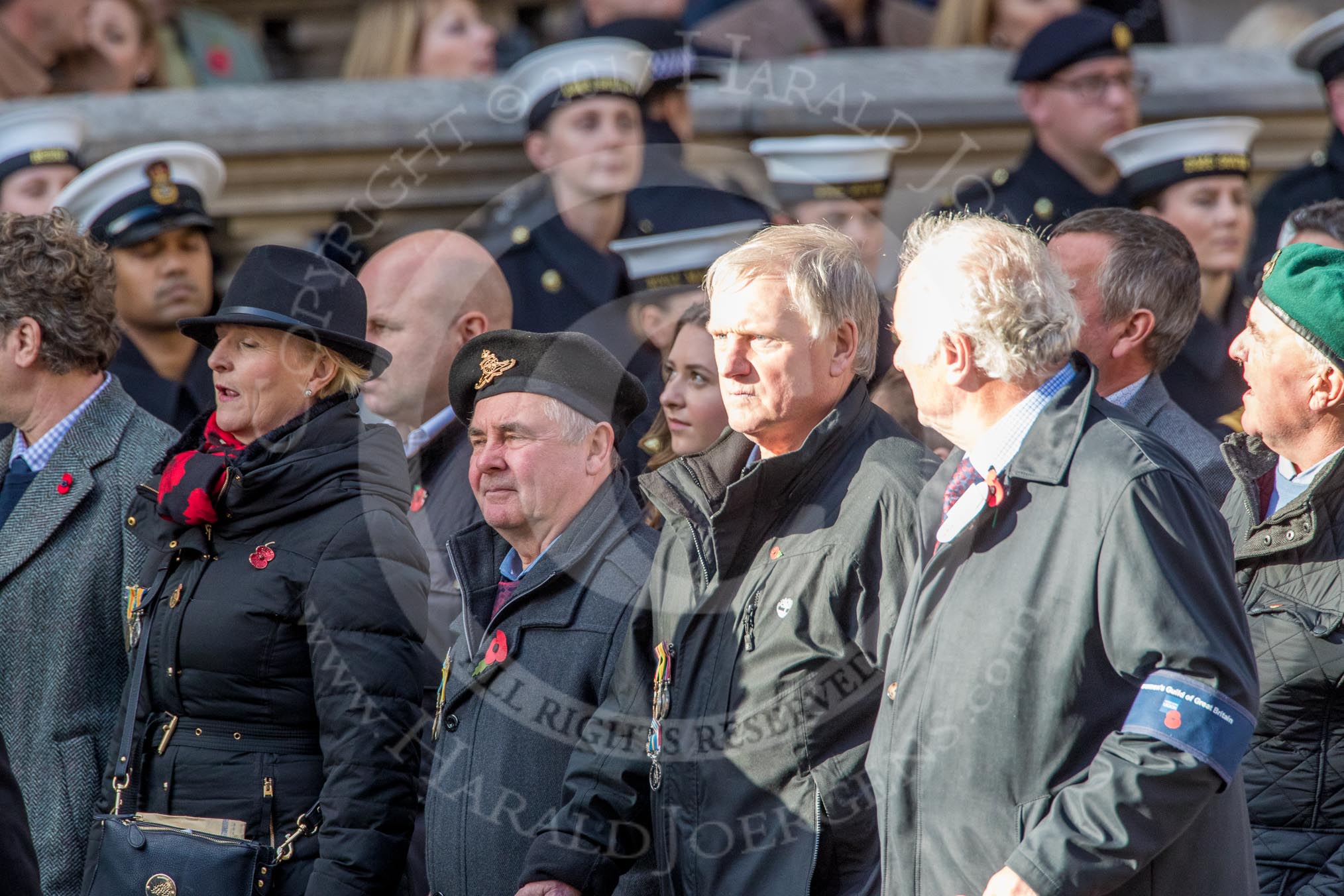 The Showmen's Guild of Great Britain (Group M18, 26 members) during the Royal British Legion March Past on Remembrance Sunday at the Cenotaph, Whitehall, Westminster, London, 11 November 2018, 12:27.