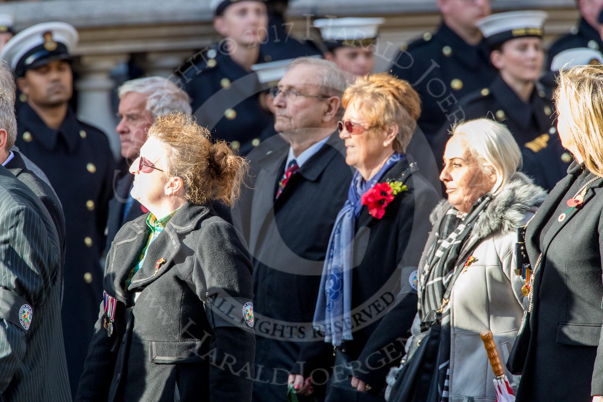 The Showmen's Guild of Great Britain (Group M18, 26 members) during the Royal British Legion March Past on Remembrance Sunday at the Cenotaph, Whitehall, Westminster, London, 11 November 2018, 12:27.