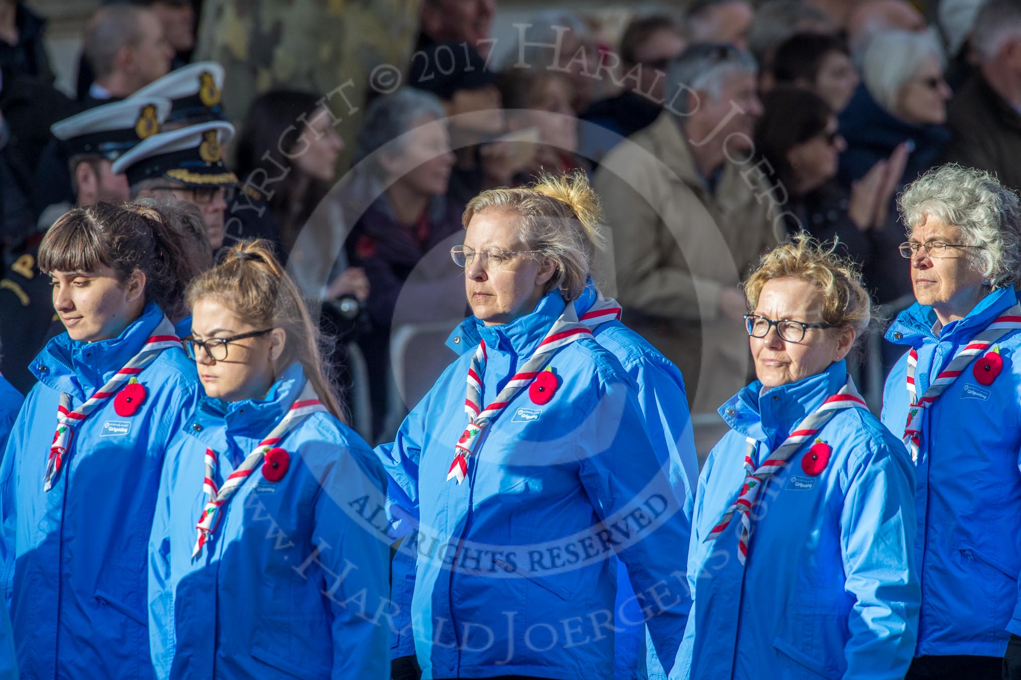 Girlguiding London and South East England(Group M38, 40 members) during the Royal British Legion March Past on Remembrance Sunday at the Cenotaph, Whitehall, Westminster, London, 11 November 2018, 12:30.
