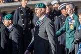 Fleet Air Arm Junglies Association  (Group E12, 22 members) during the Royal British Legion March Past on Remembrance Sunday at the Cenotaph, Whitehall, Westminster, London, 11 November 2018, 11:43.