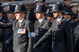Metropolitan Special Constabulary (Group M17, 40 members) during the Royal British Legion March Past on Remembrance Sunday at the Cenotaph, Whitehall, Westminster, London, 11 November 2018, 12:27.