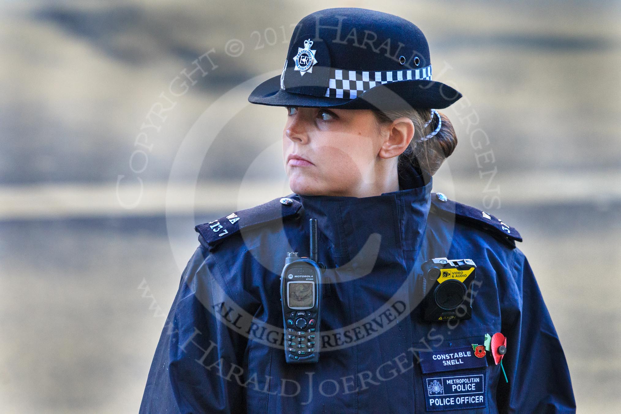 Metropolitan Police Constable Snell keeping an eye on the crowds during the Remembrance Sunday Cenotaph Ceremony 2018 at Horse Guards Parade, Westminster, London, 11 November 2018, 08:46.