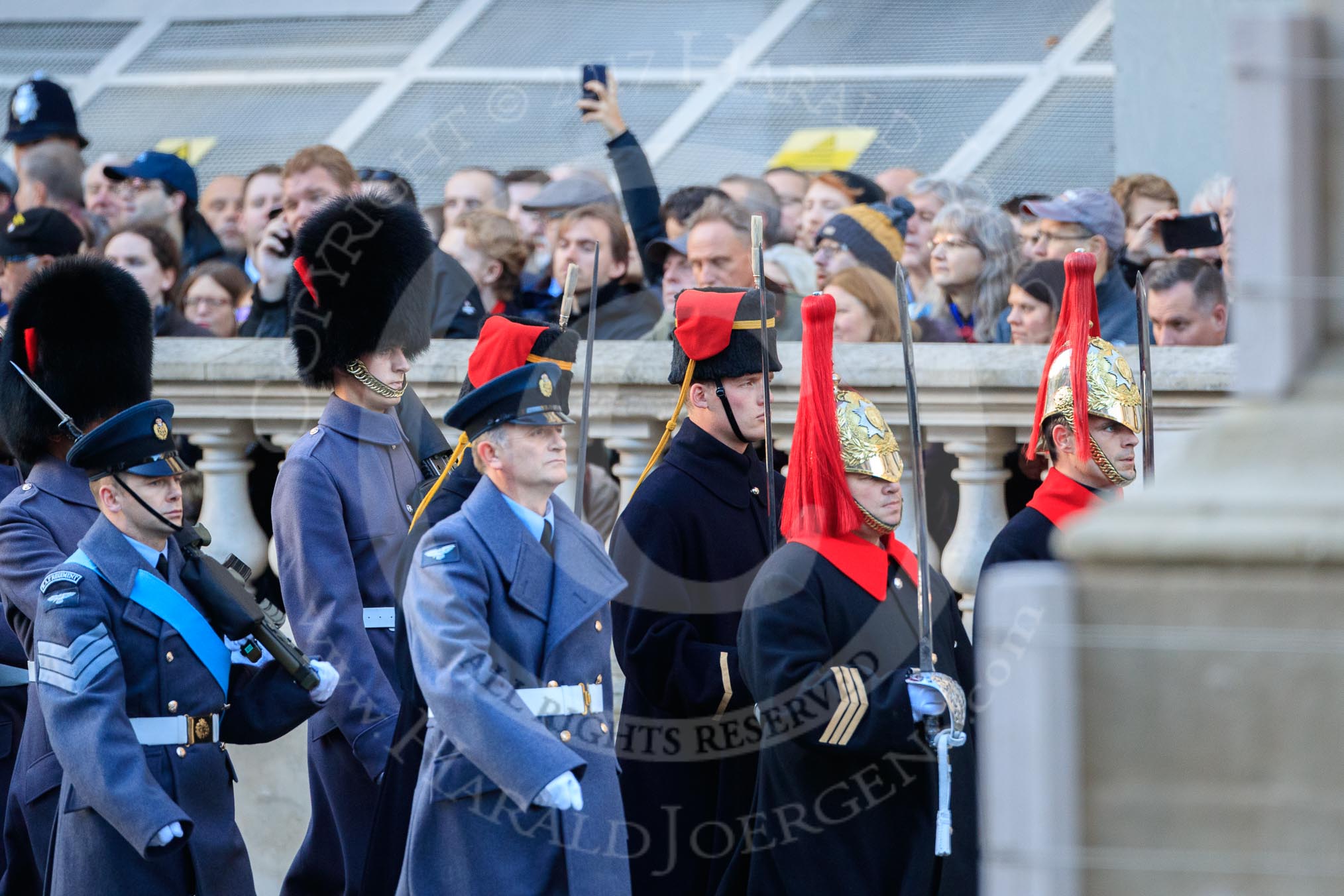 The first group of the Armed Forces arrives on Whitehall before the Remembrance Sunday Cenotaph Ceremony 2018 at Horse Guards Parade, Westminster, London, 11 November 2018, 09:48. They might be the "markers" for their service detachments, followed by stretcher bearers.