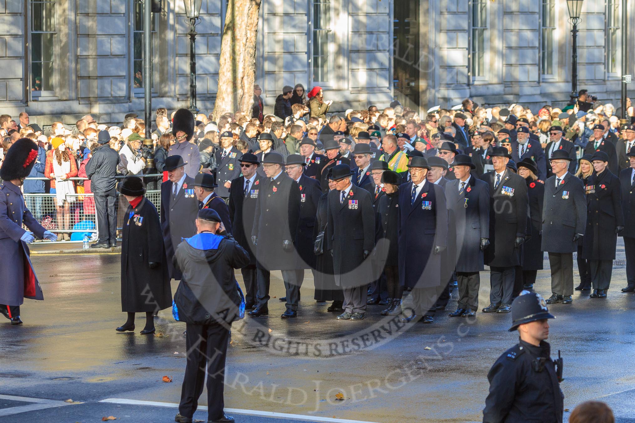 The group of RBL official has arrived at their position in the centre of Whitehall before the Remembrance Sunday Cenotaph Ceremony 2018 at Horse Guards Parade, Westminster, London, 11 November 2018, 10:08.