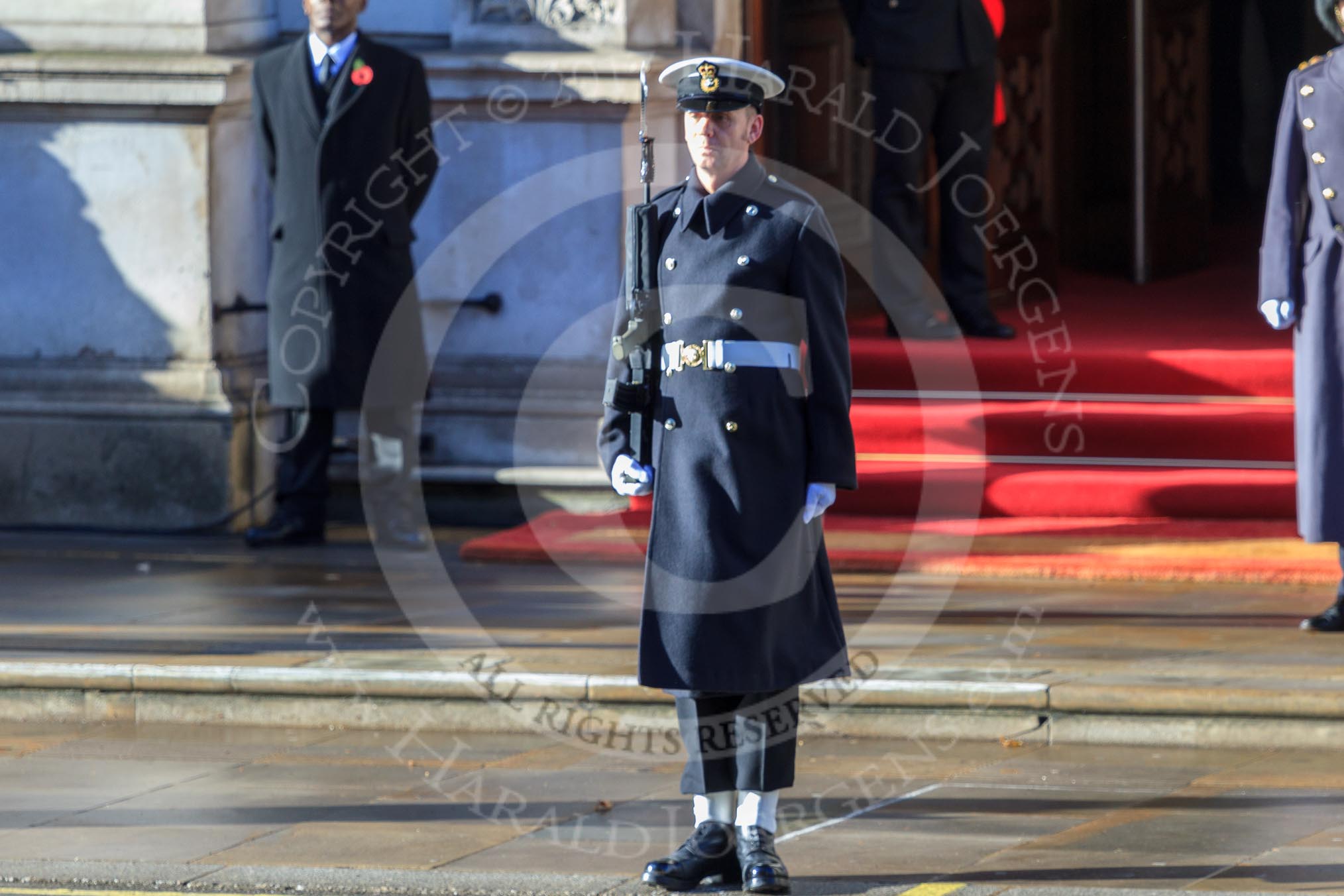 The Royal Navy "marker" is in position for his service detachment to find their place on Whitehall before the Remembrance Sunday Cenotaph Ceremony 2018 at Horse Guards Parade, Westminster, London, 11 November 2018, 10:10.