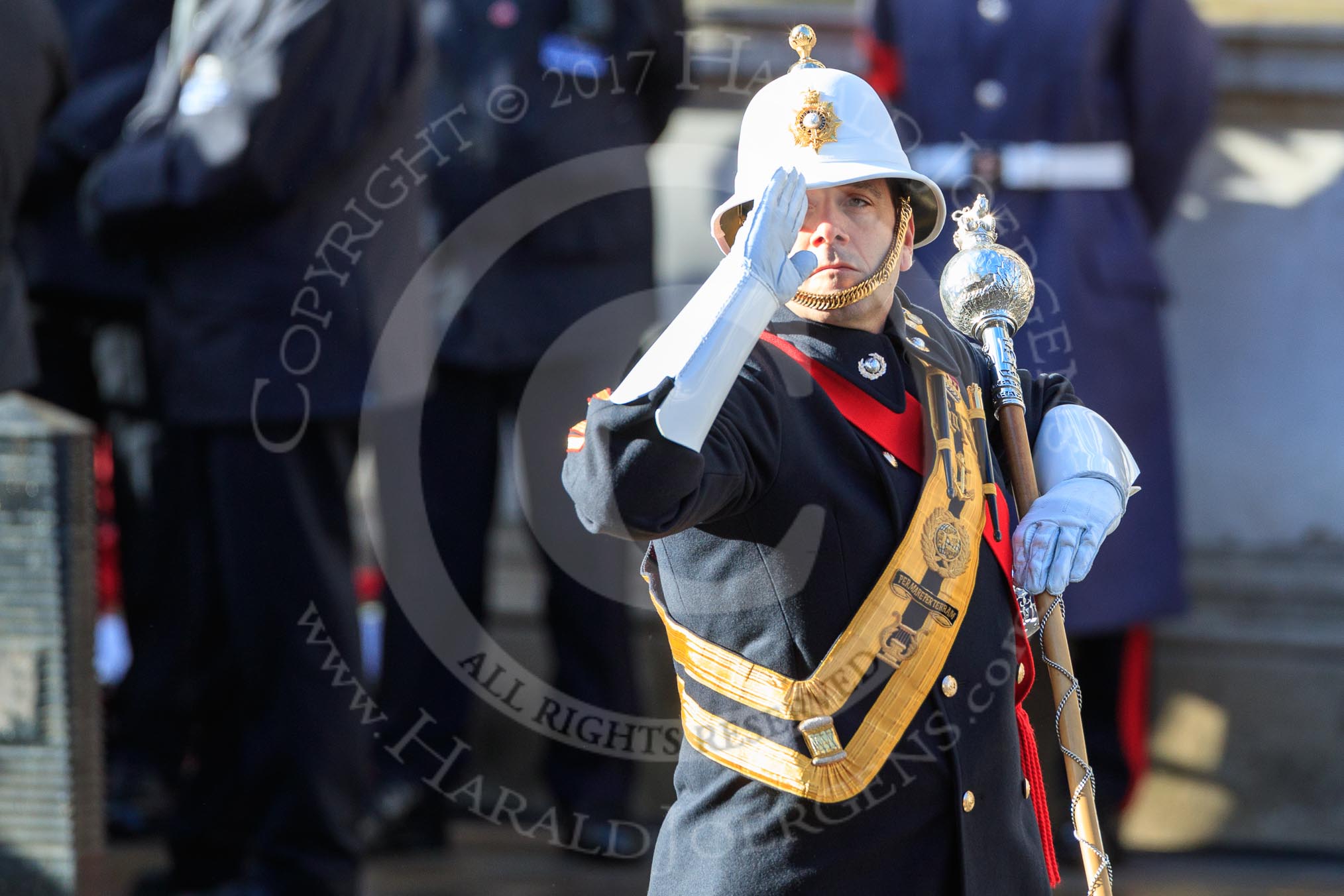 The Band of the Royal Marines drum major salutes the Cenotaph during Remembrance Sunday Cenotaph Ceremony 2018 at Horse Guards Parade, Westminster, London, 11 November 2018, 10:18.