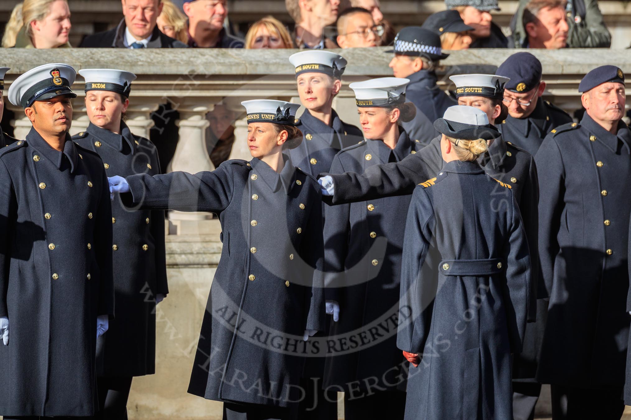 The members of the Service detachment from the Royal Navy are checking their distance from each other before the Remembrance Sunday Cenotaph Ceremony 2018 at Horse Guards Parade, Westminster, London, 11 November 2018, 10:21.