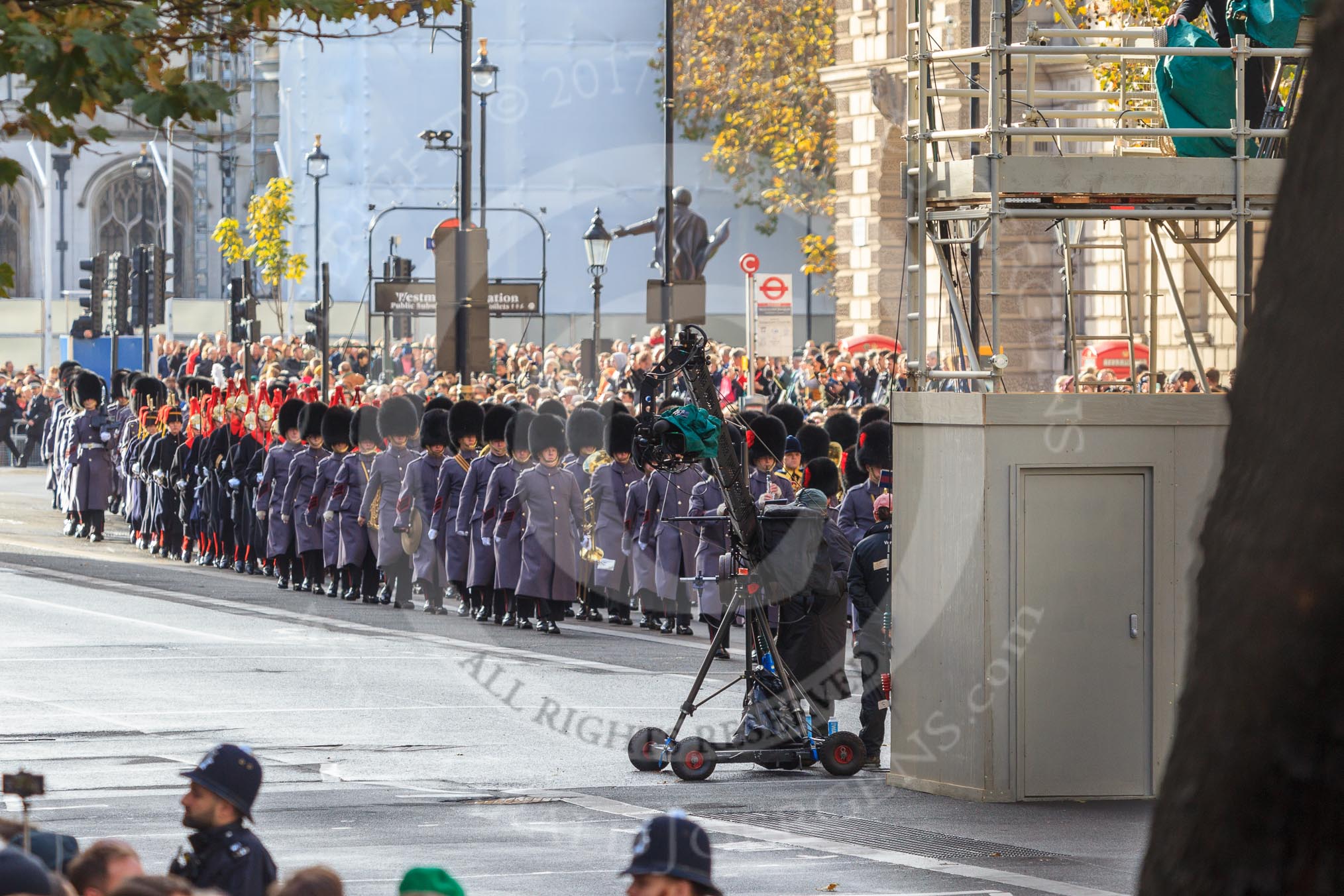 More army service detachments arriving on Whitehall before the Remembrance Sunday Cenotaph Ceremony 2018 at Horse Guards Parade, Westminster, London, 11 November 2018, 10:24. They all march from  Wellington Barracks via Birdcage Walk, Great George Street and Parliament Street to the Cenotaph