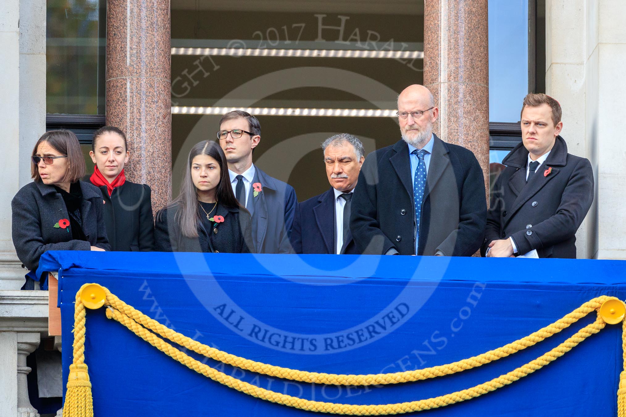 Early guests on one of the eastern balconies of the Foreign and Commonwealth Office before the Remembrance Sunday Cenotaph Ceremony 2018 at Horse Guards Parade, Westminster, London, 11 November 2018, 10:34.