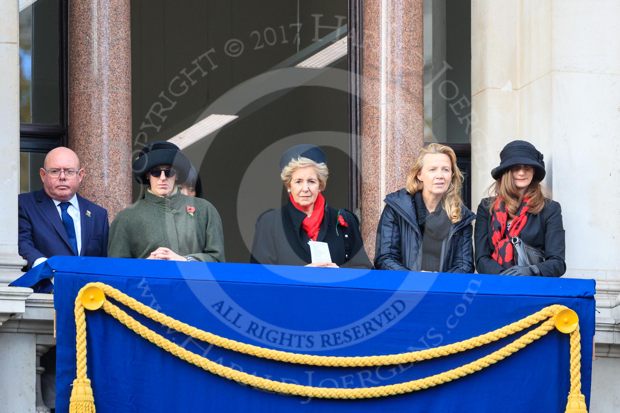 Early guests on one of the eastern balconies of the Foreign and Commonwealth Office before the Remembrance Sunday Cenotaph Ceremony 2018 at Horse Guards Parade, Westminster, London, 11 November 2018, 10:34.