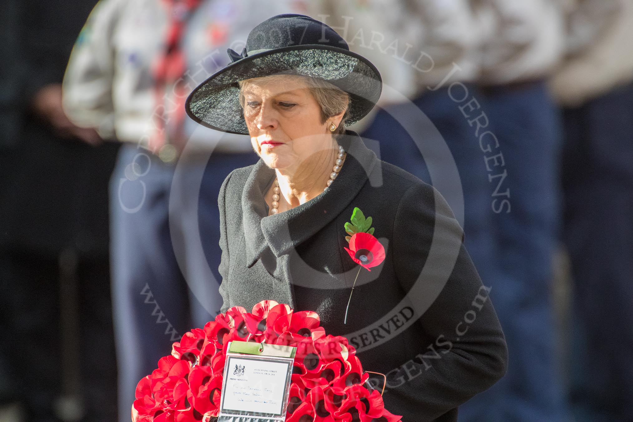 The Rt Hon Theresa May MP, Prime Minister, with her wreath on behalf of the Government during the Remembrance Sunday Cenotaph Ceremony 2018 at Horse Guards Parade, Westminster, London, 11 November 2018, 11:07.