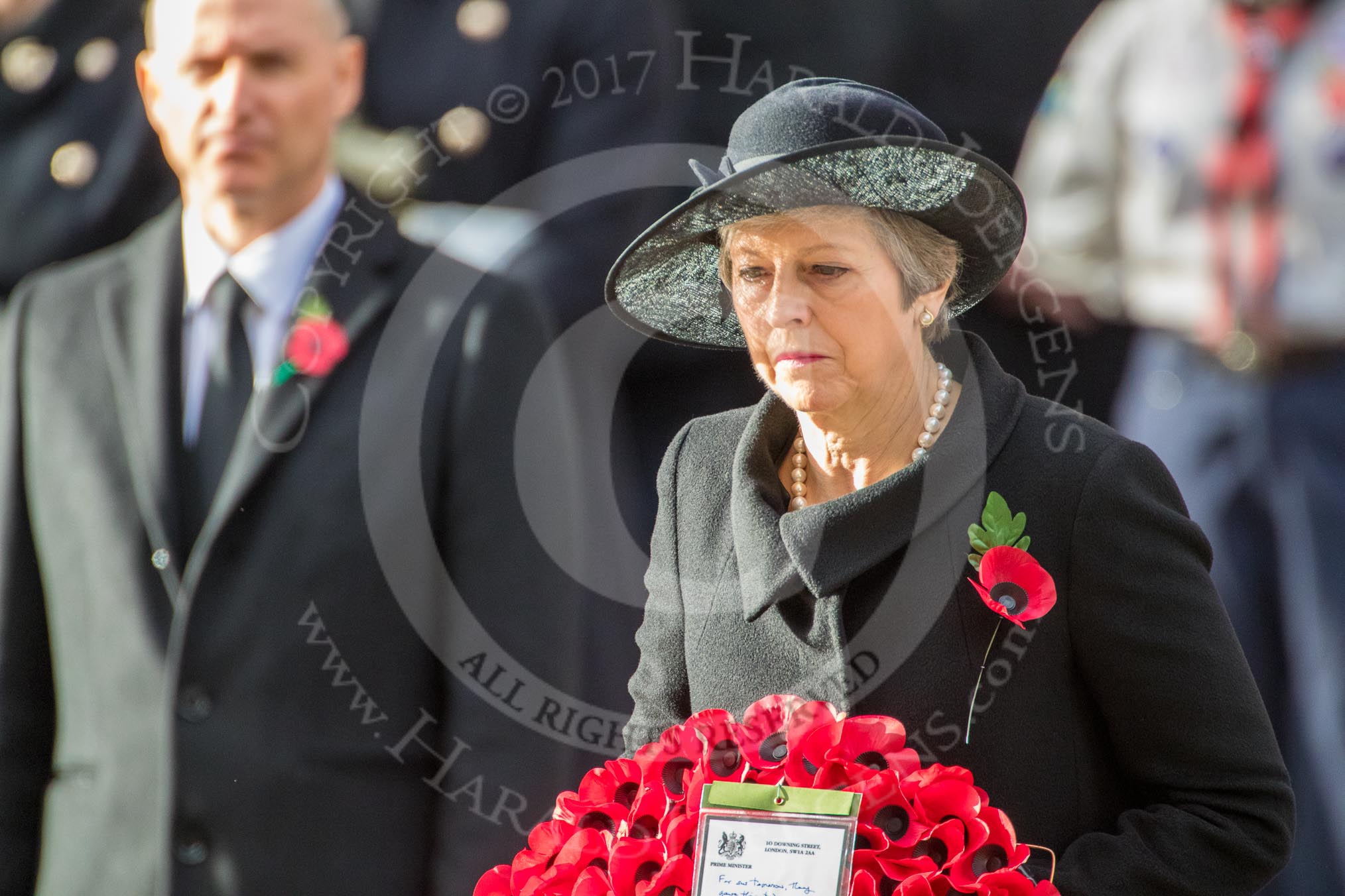 The Rt Hon Theresa May MP, Prime Minister, with her wreath on behalf of the Government during the Remembrance Sunday Cenotaph Ceremony 2018 at Horse Guards Parade, Westminster, London, 11 November 2018, 11:07.