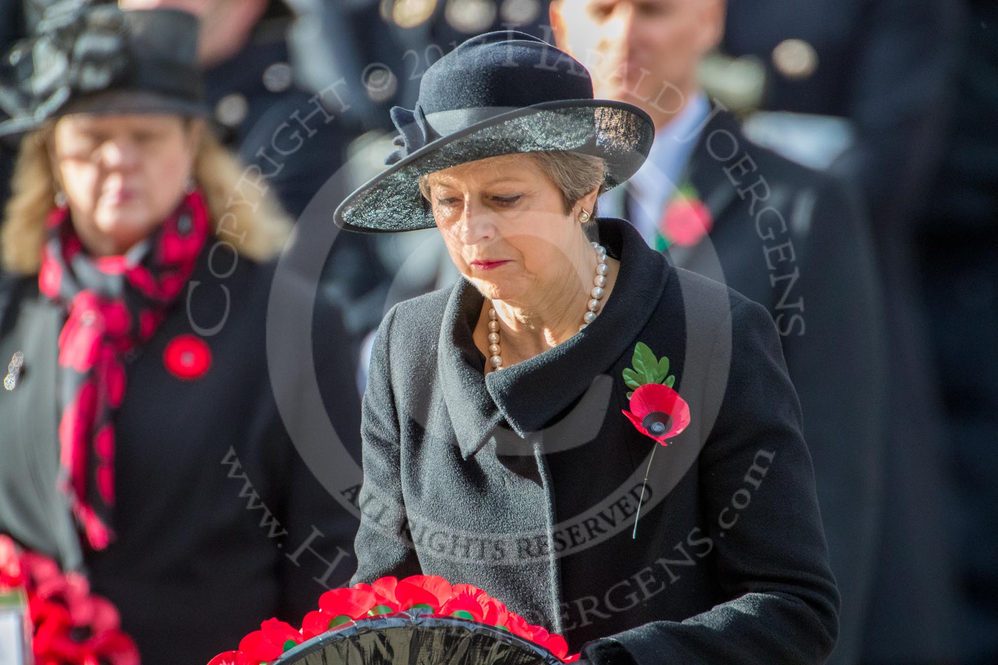 The Rt Hon Theresa May MP, Prime Minister, with her wreath on behalf of the Government during the Remembrance Sunday Cenotaph Ceremony 2018 at Horse Guards Parade, Westminster, London, 11 November 2018, 11:07.