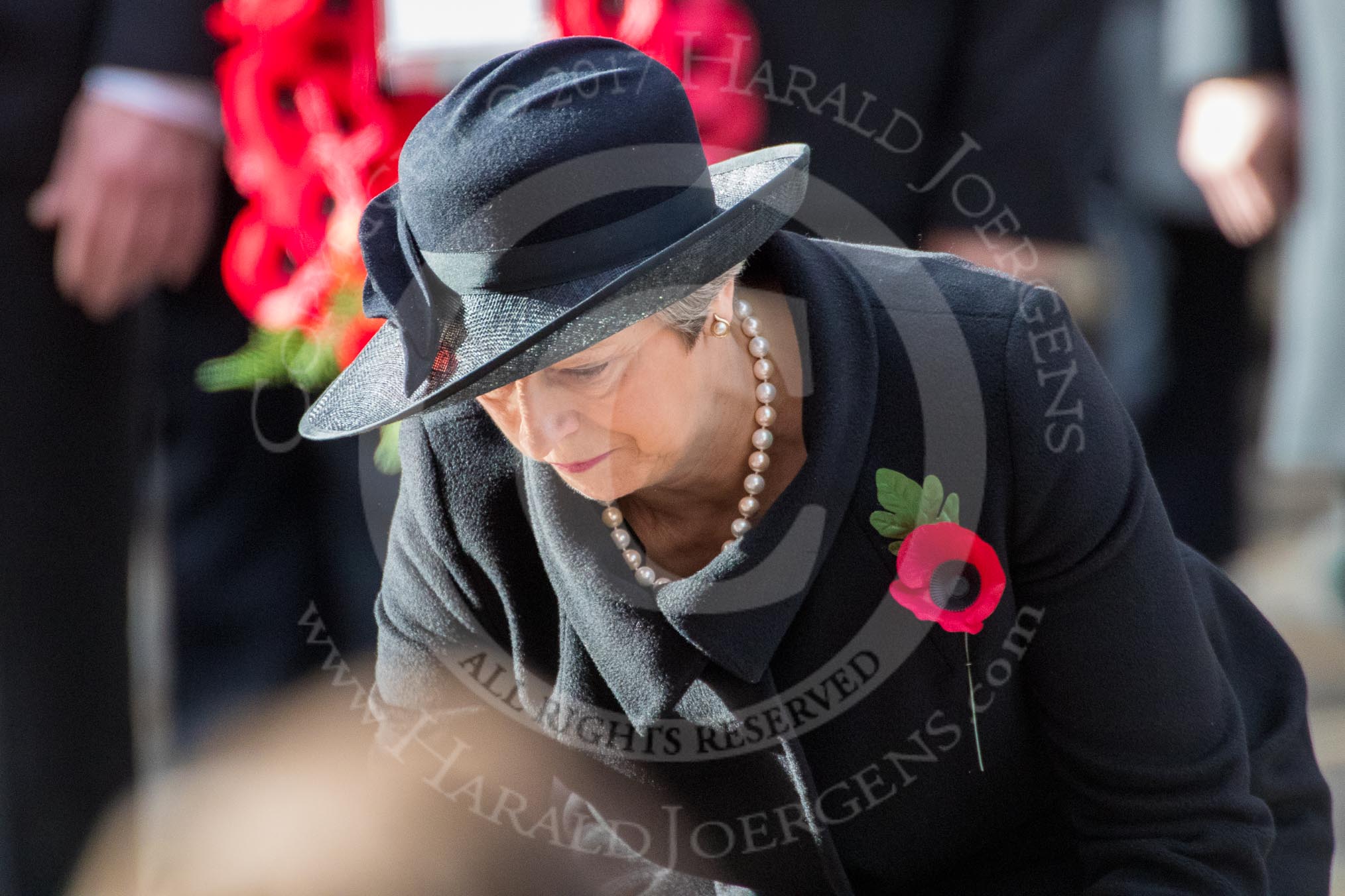 The Rt Hon Theresa May MP, Prime Minister, with her wreath on behalf of the Government during the Remembrance Sunday Cenotaph Ceremony 2018 at Horse Guards Parade, Westminster, London, 11 November 2018, 11:07.