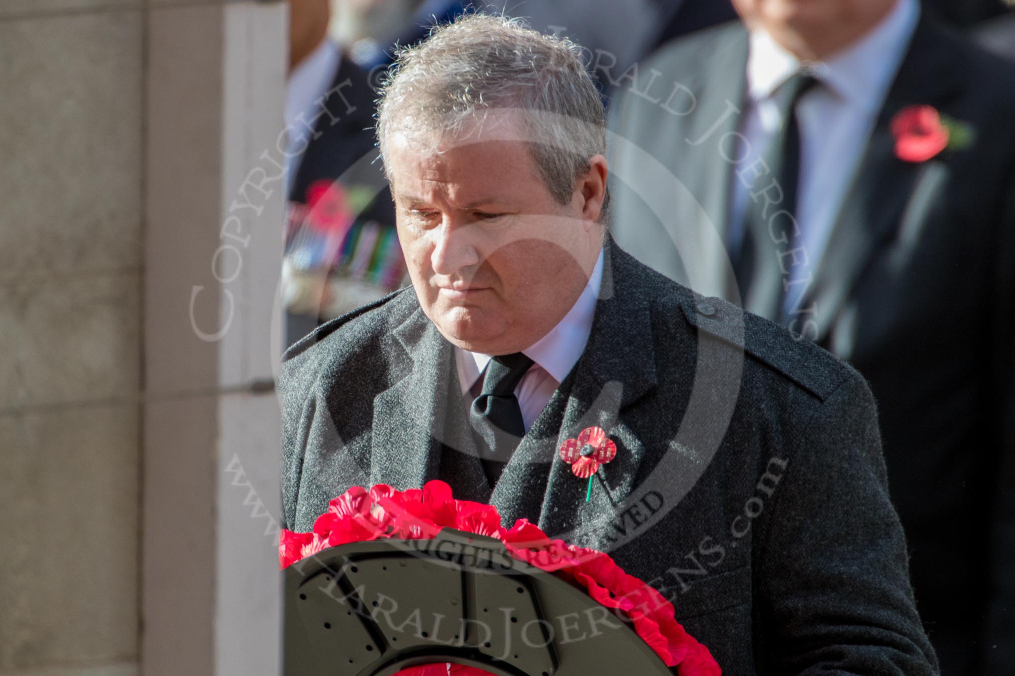 Mr Ian Blackford MP (the Westminster Scottish National Party Leader on the behalf of the SNP/the Plaid Cymru Parliamentary Group)  during the Remembrance Sunday Cenotaph Ceremony 2018 at Horse Guards Parade, Westminster, London, 11 November 2018, 11:09.