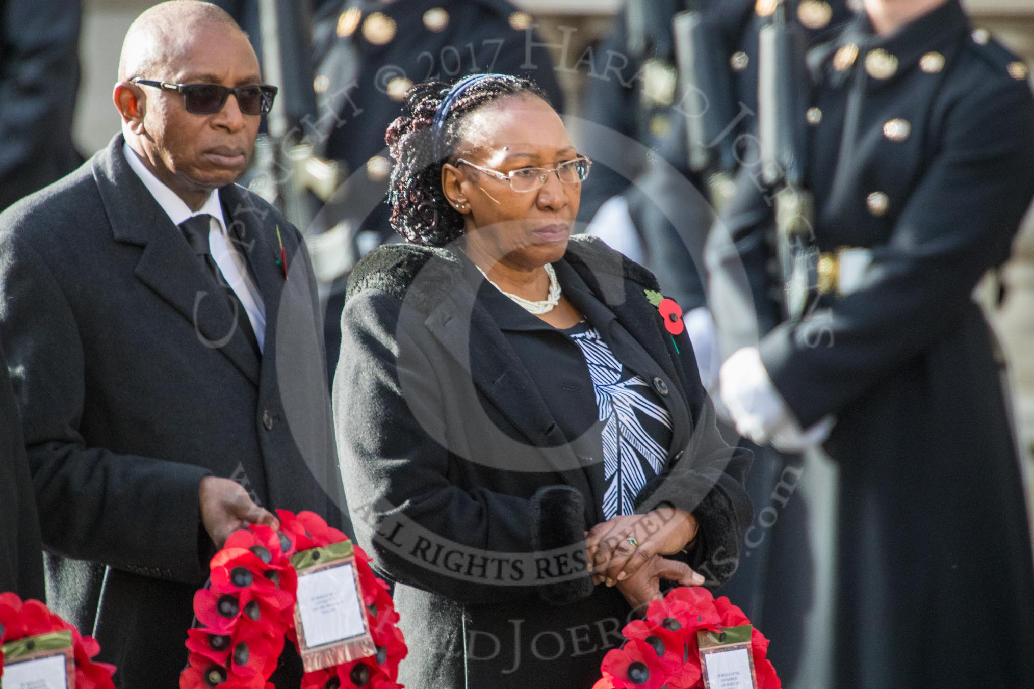 The High Commissioner of Malawi, Mr Kena A. Mphonda, and The Deputy High Commissioner of Kenya, Mrs Grace Cerere, during Remembrance Sunday Cenotaph Ceremony 2018 at Horse Guards Parade, Westminster, London, 11 November 2018, 11:12.