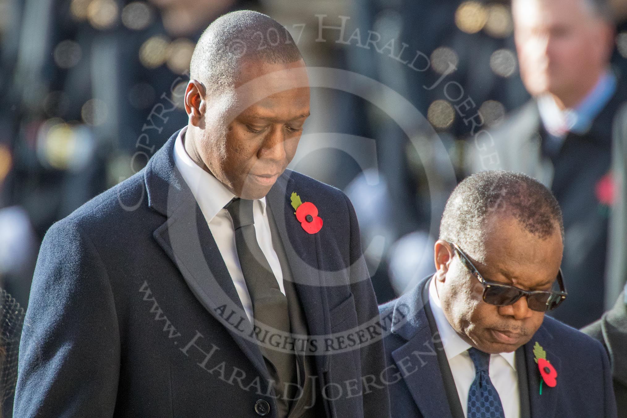 The Deputy Head of Mission of The Gambia, Kalifa Bojang, and the  High Commissioner of Zambia,  Muyeba Shichapwa Chikonde, during Remembrance Sunday Cenotaph Ceremony 2018 at Horse Guards Parade, Westminster, London, 11 November 2018, 11:13.