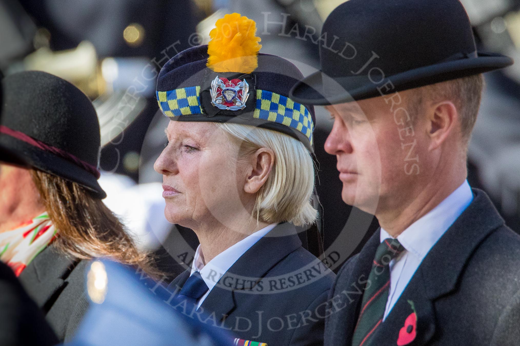 In focus and in the background centre is Margaret Brown, the Royal British Legion Angus and Perthshire Area Secretary, during Remembrance Sunday Cenotaph Ceremony 2018 at Horse Guards Parade, Westminster, London, 11 November 2018, 11:28.