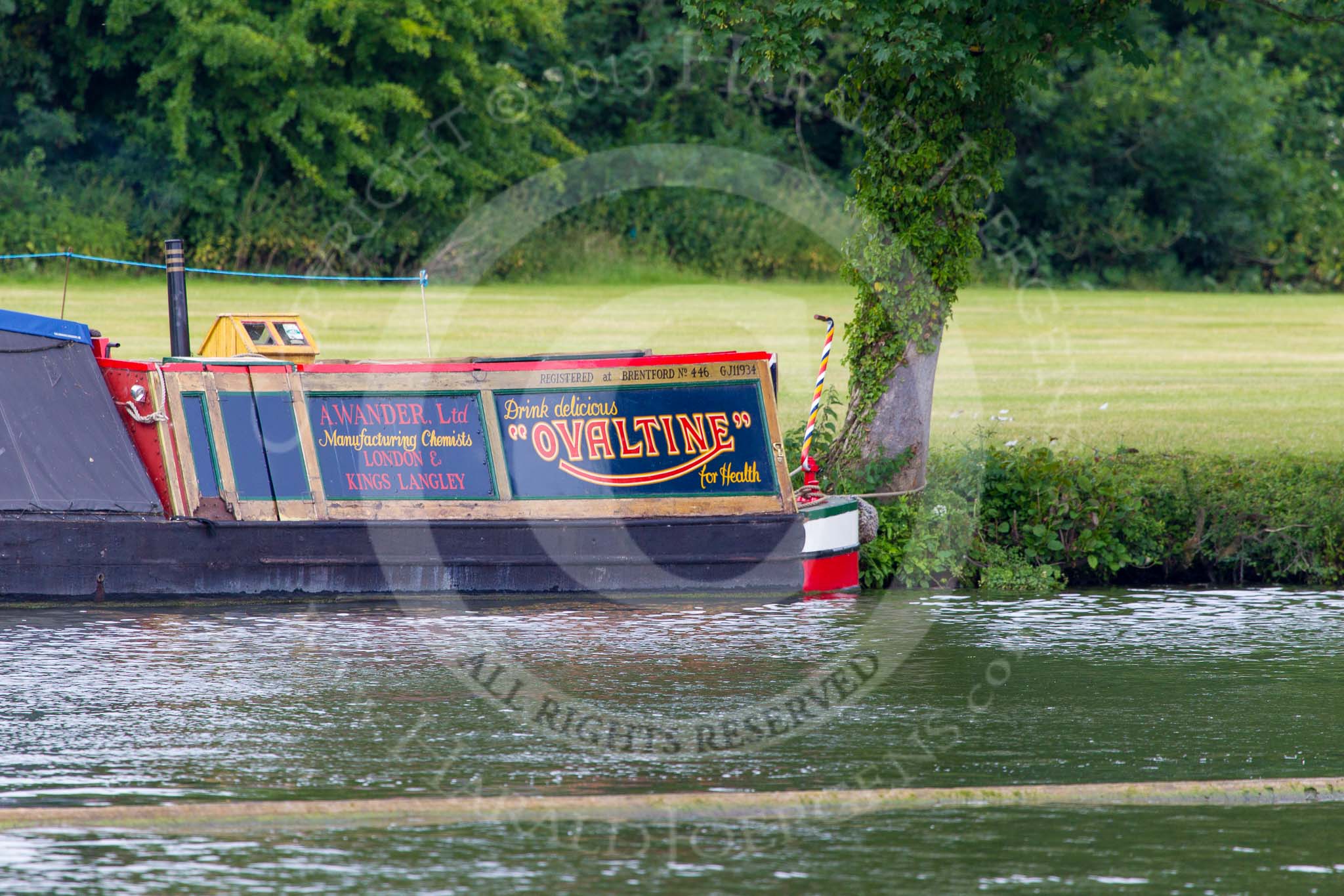 Henley Royal Regatta 2013 (Monday): Traditional "Ovaltine" narrowboat "Albert" moored on the eastern side of the Thames.
River Thames between Henley and Temple Island,
Henley-on-Thames,
Berkshire,
United Kingdom,
on 01 July 2013 at 14:42, image #17