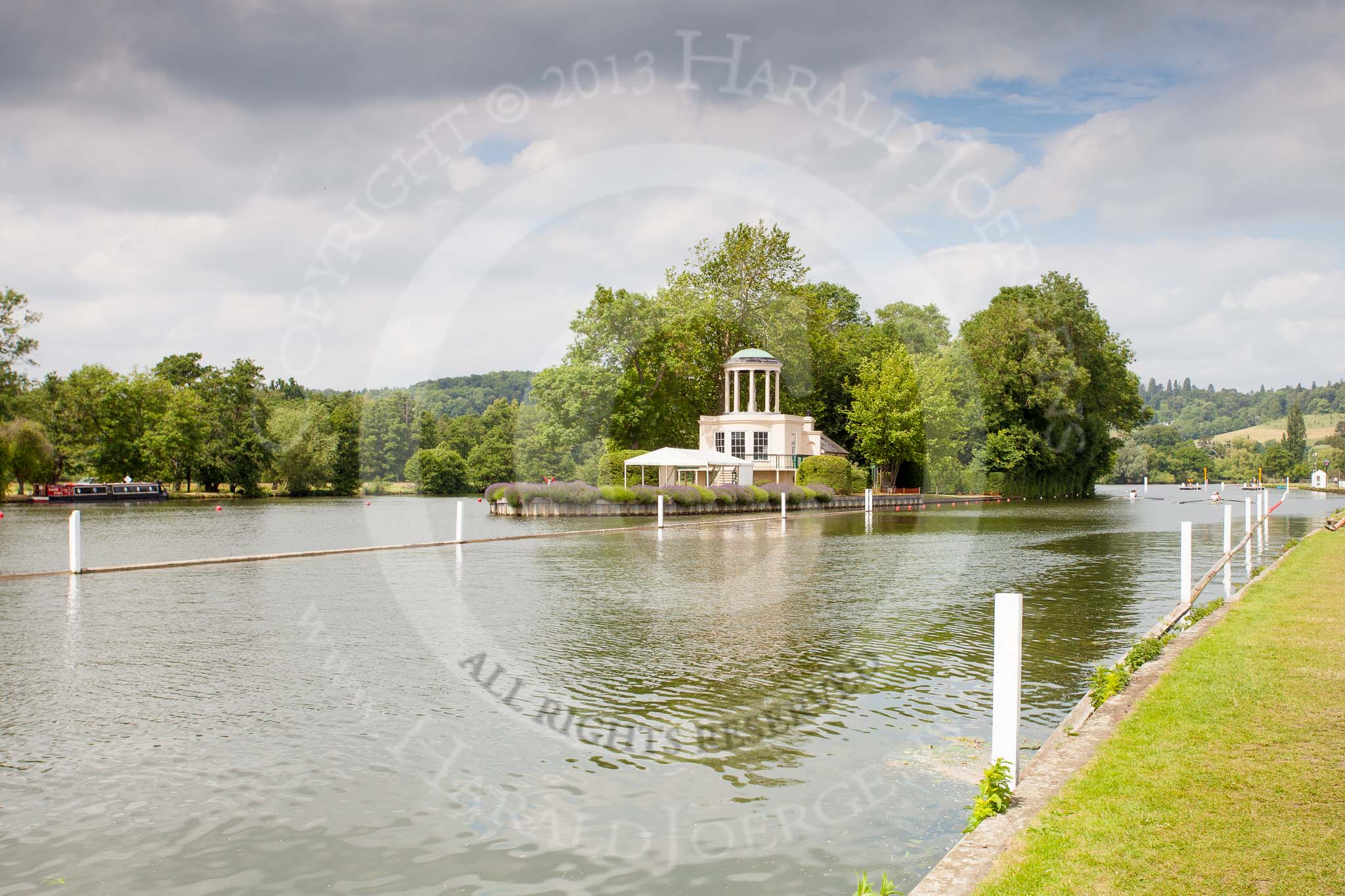 Henley Royal Regatta 2013 (Monday): Temple Island, close to the start of the race, with the ornamental temple originally designed as a fishing lodge for Fawley Court (close to the 1-mile marker)..
River Thames between Henley and Temple Island,
Henley-on-Thames,
Berkshire,
United Kingdom,
on 01 July 2013 at 14:58, image #23