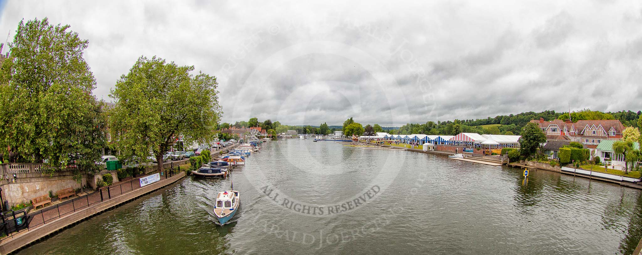 Henley Royal Regatta 2013 (Wednesday): Henley-on-Thames seen from Henley Bridge - the Red Lion Lawn on the left, and the boat tents of the Henley Royal Regatta on the right, during the Henley Royal Regatta..
River Thames between Henley and Temple Island,
Henley-on-Thames,
Berkshire,
United Kingdom,
on 03 July 2013 at 09:40, image #18