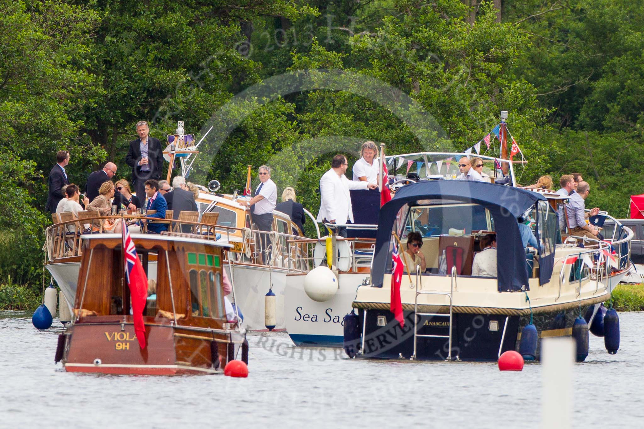 Henley Royal Regatta 2013, Thursday.
River Thames between Henley and Temple Island,
Henley-on-Thames,
Berkshire,
United Kingdom,
on 04 July 2013 at 11:32, image #213